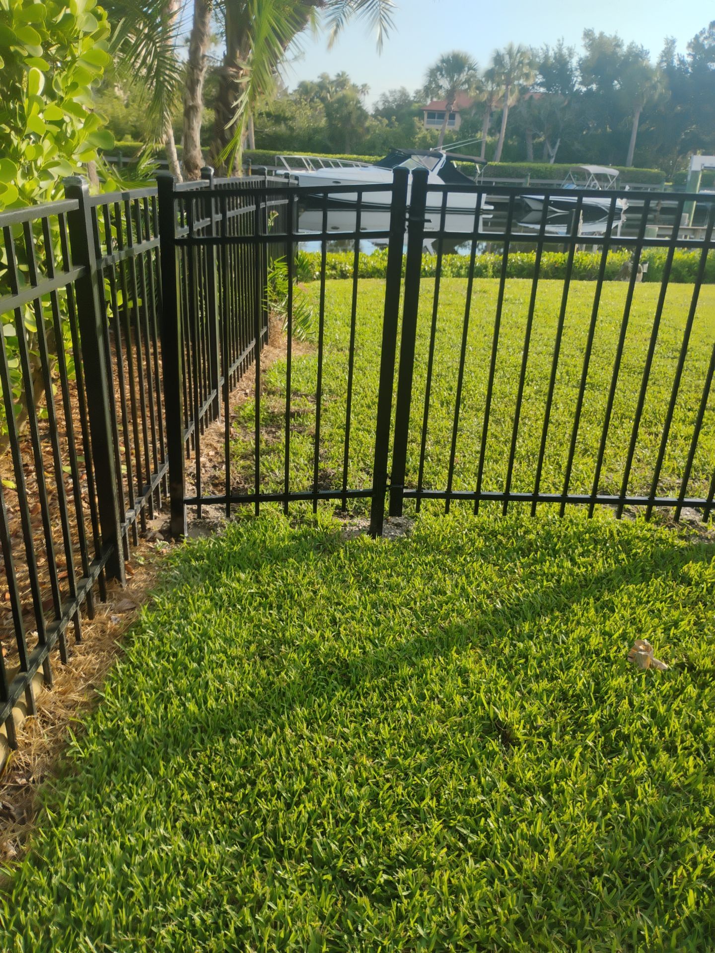 Black Aluminum Waterfront Fence Installation in Osprey by True Fence LLC
