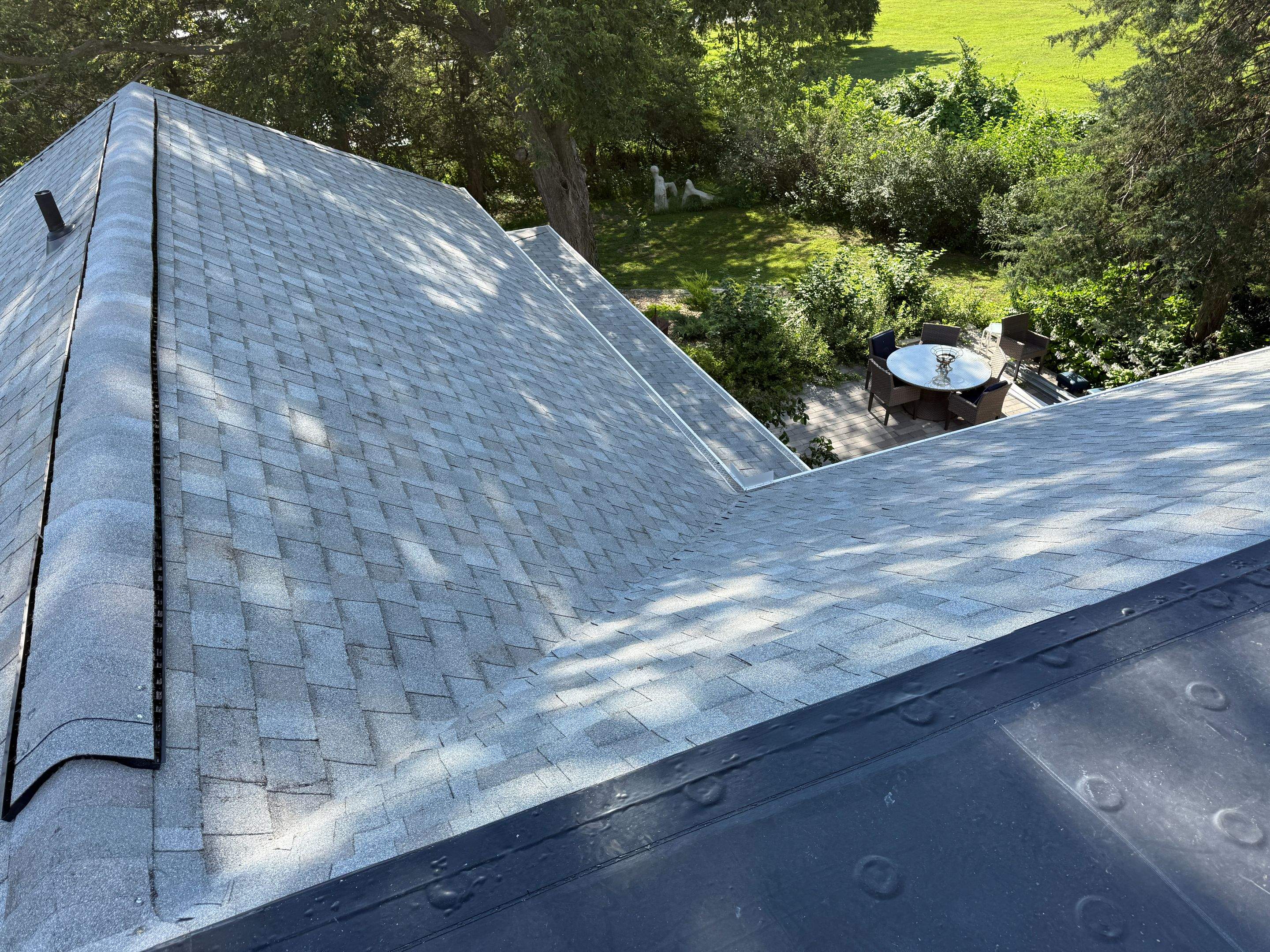Asphalt Shingle and EPDM Membrane Roof Installation in Mineola by Star Home