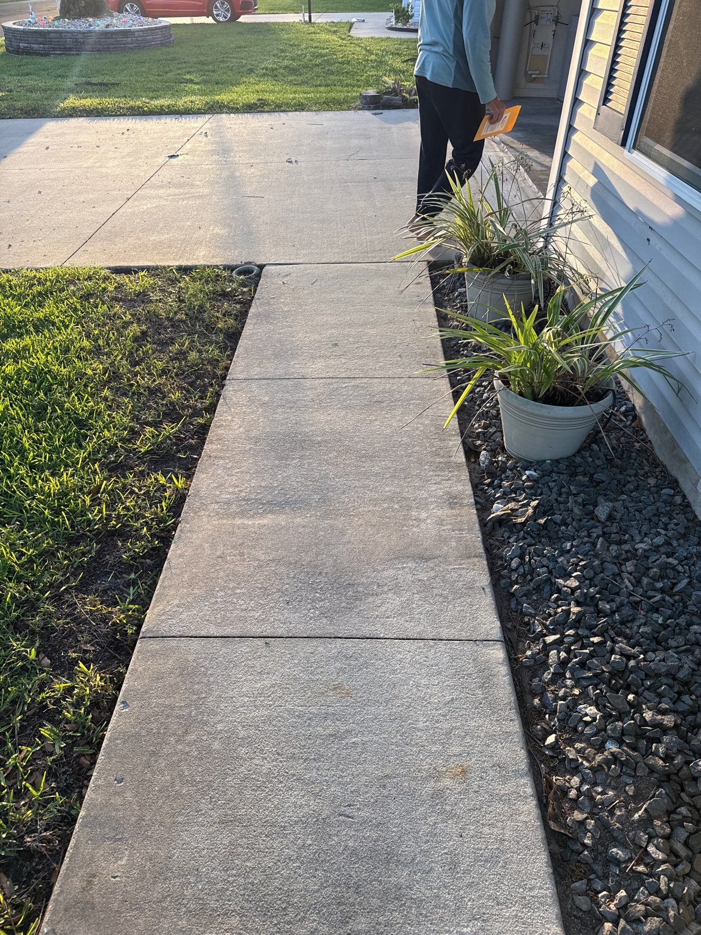 Driveway Tidal Wave with Cool Breeze Border and Sidewalk by Innovative Concrete Coatings 