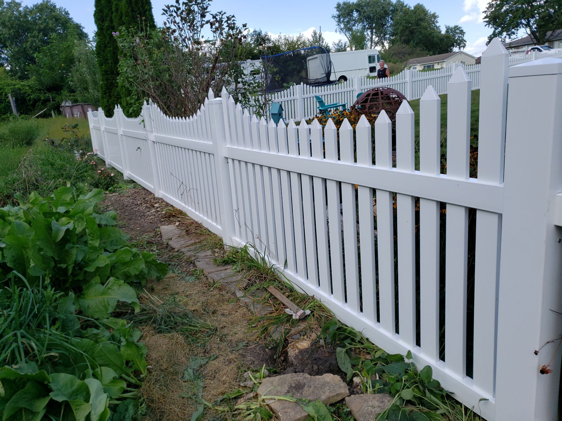 White Vinyl Spaced Picket Fence Installation in Waterloo by Perfect Picket Fence and Stain