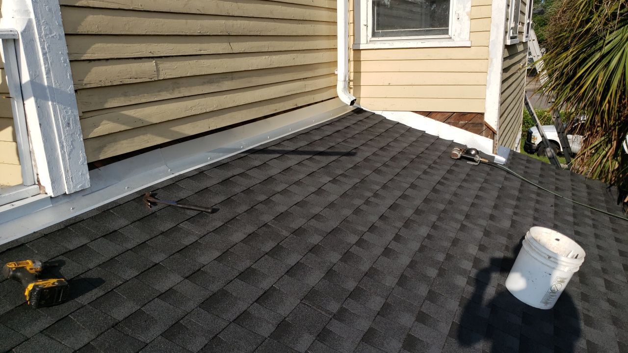 Residential Roofing Installation using Roof Replacement by American Roofing & Construction LLC