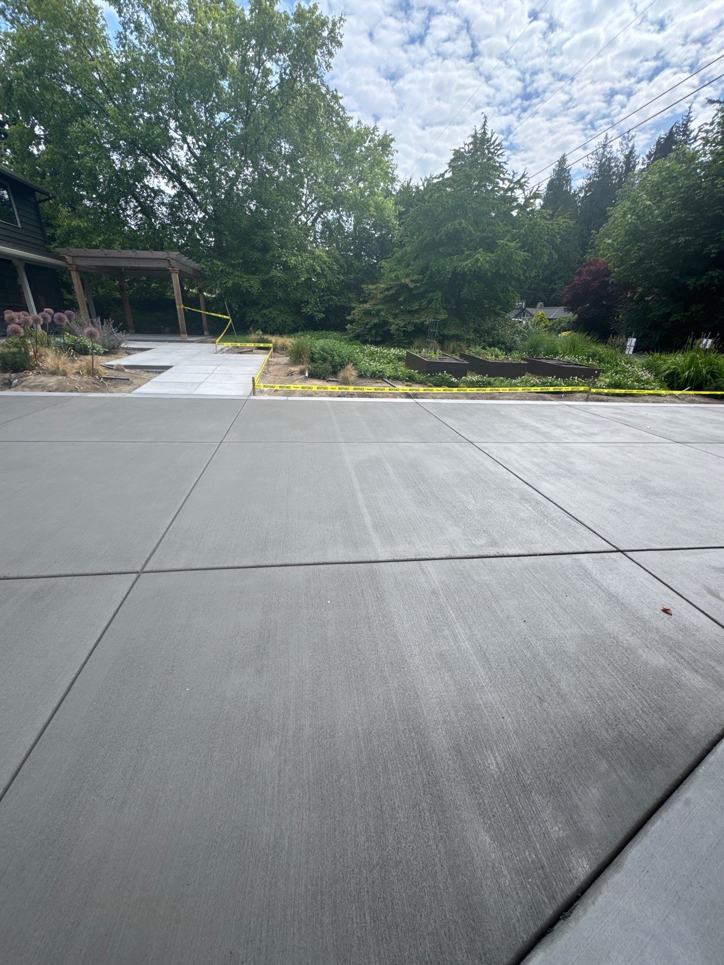 Concrete Driveway Makeover | Edmonds  by Jireh Asphalt & Concrete Inc 