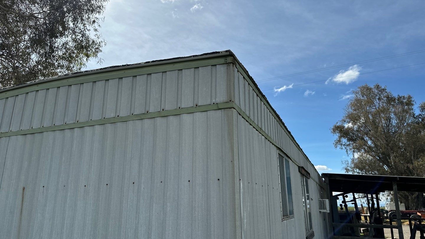 Foam and coatings on mobile home by Straight Edge Roofing Inc