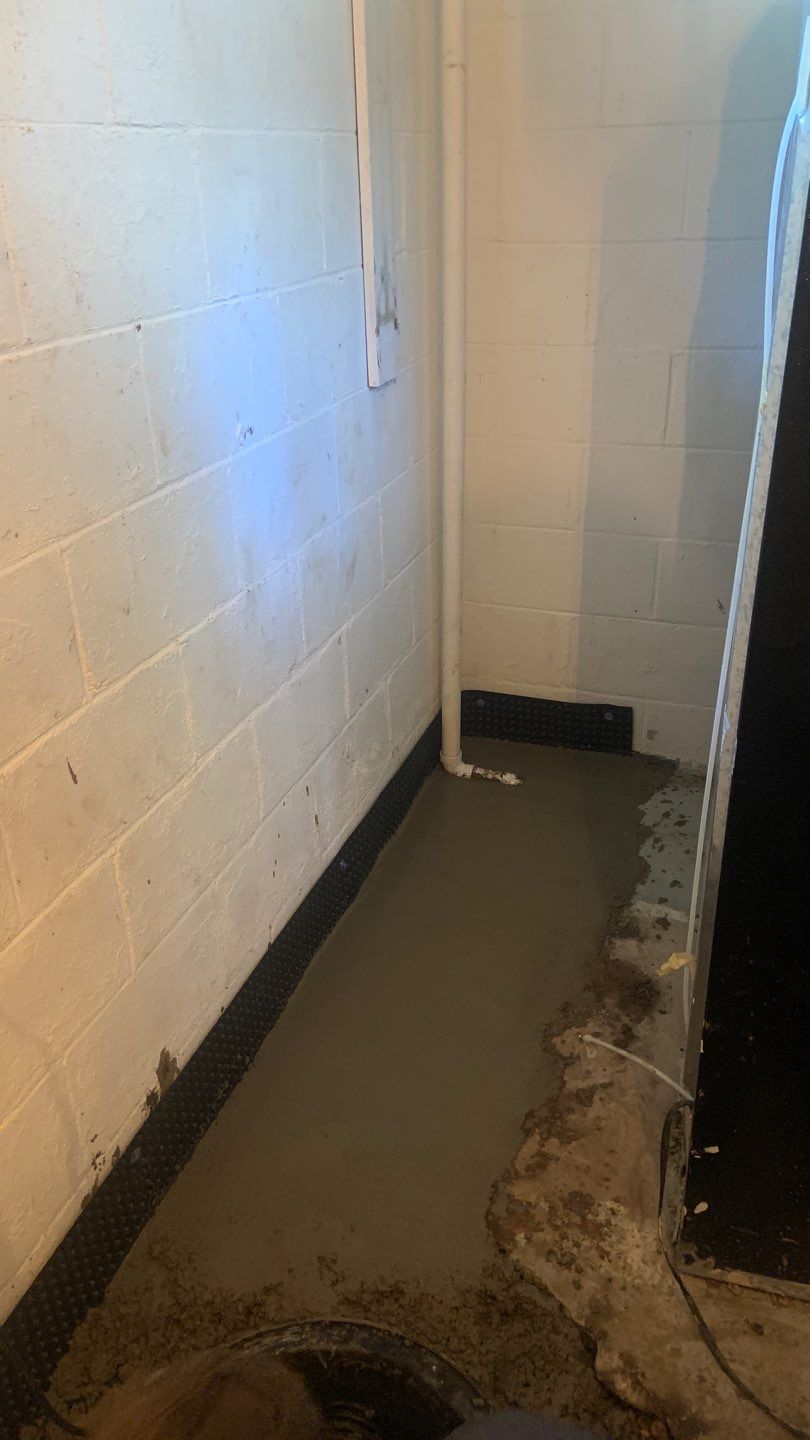 Solving a One-Wall Water Issue in St. Paul by Waterproofing Northeast