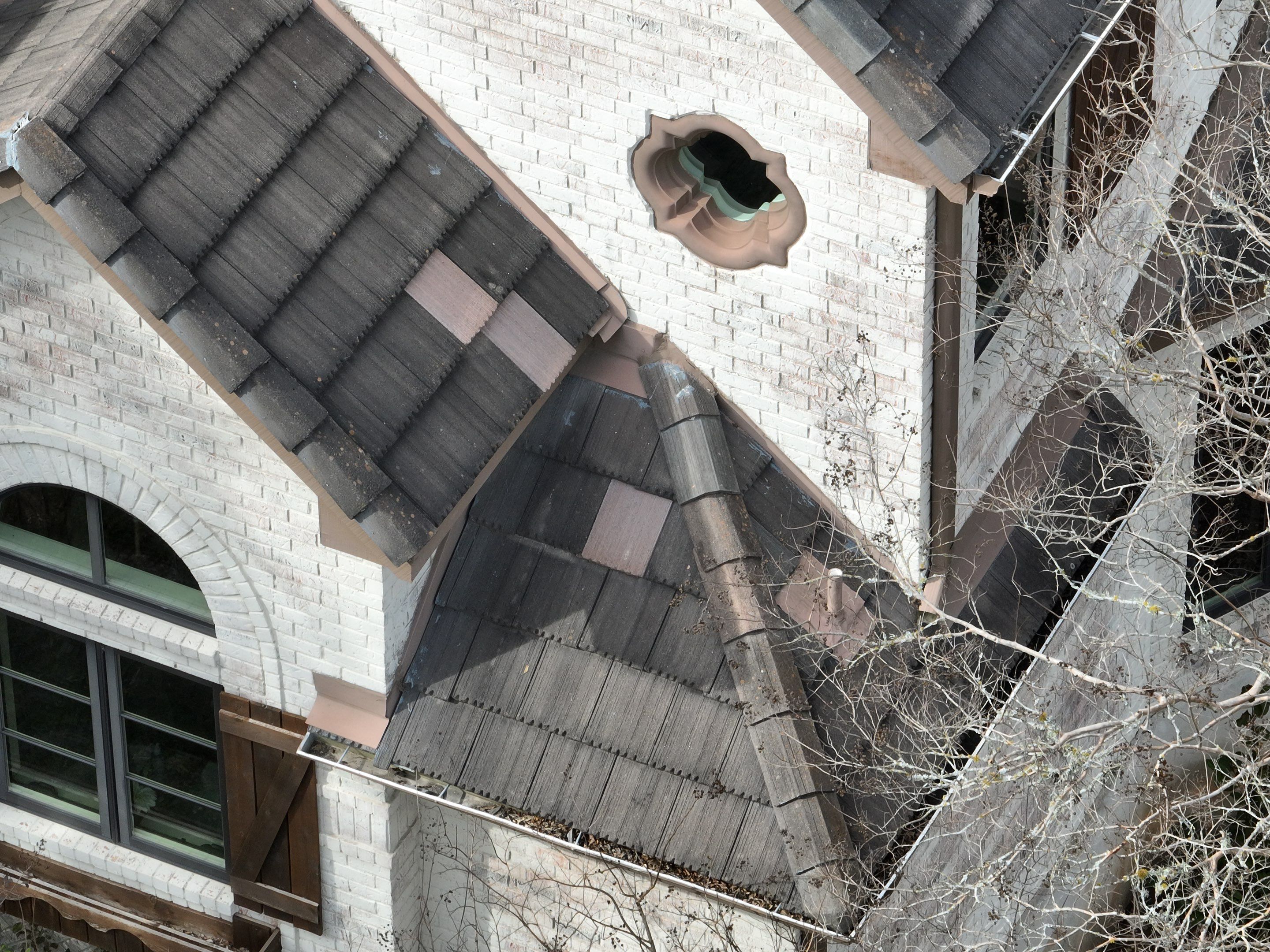 Tile Roof Repair  by Premier Roofing and Contracting