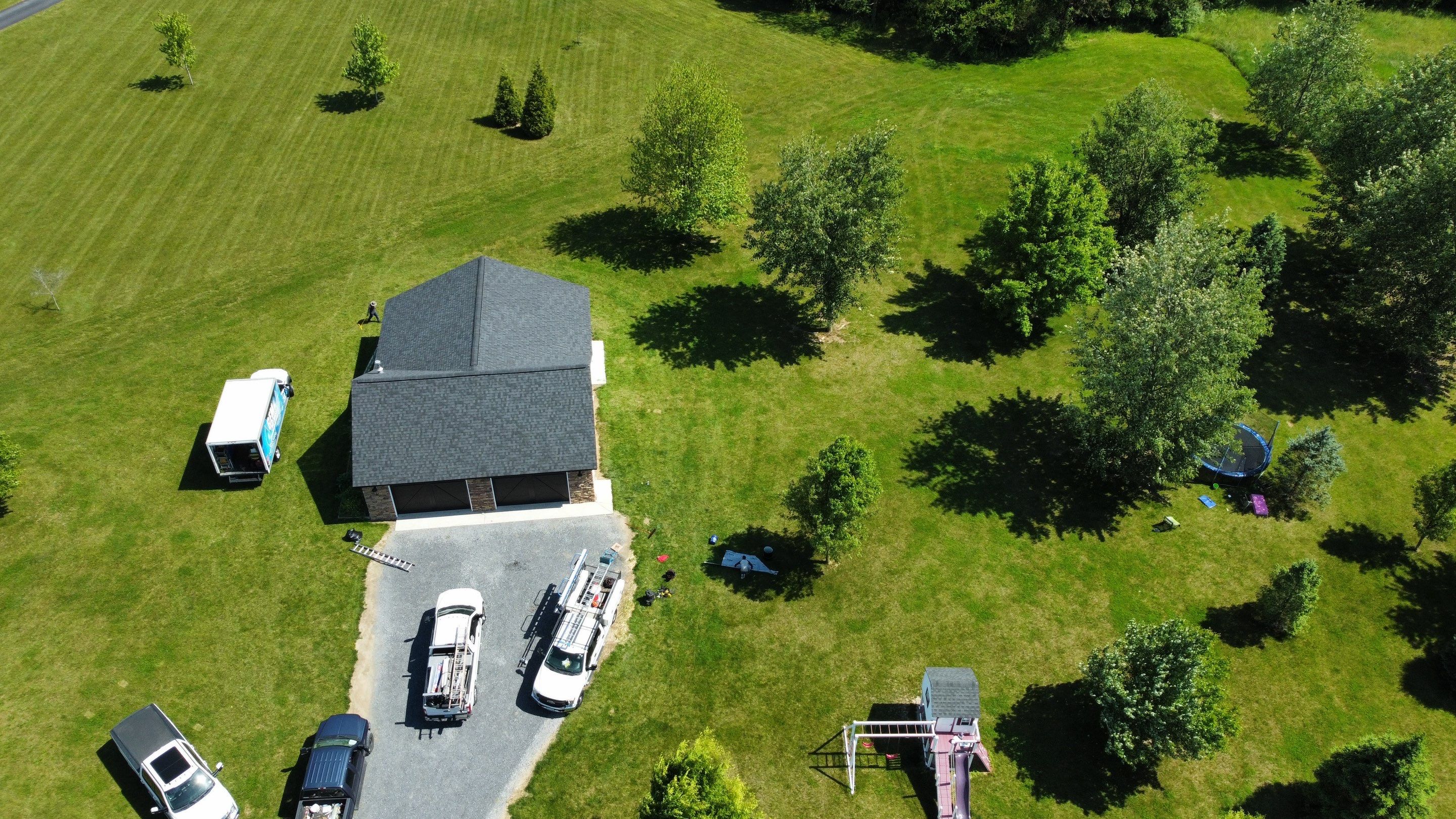 Roof Damage using Certainteed Lifetime Roofing System- Moire Black Landmark Pro shingkes with shadow ridge caps. by BulletpROOF Exteriors