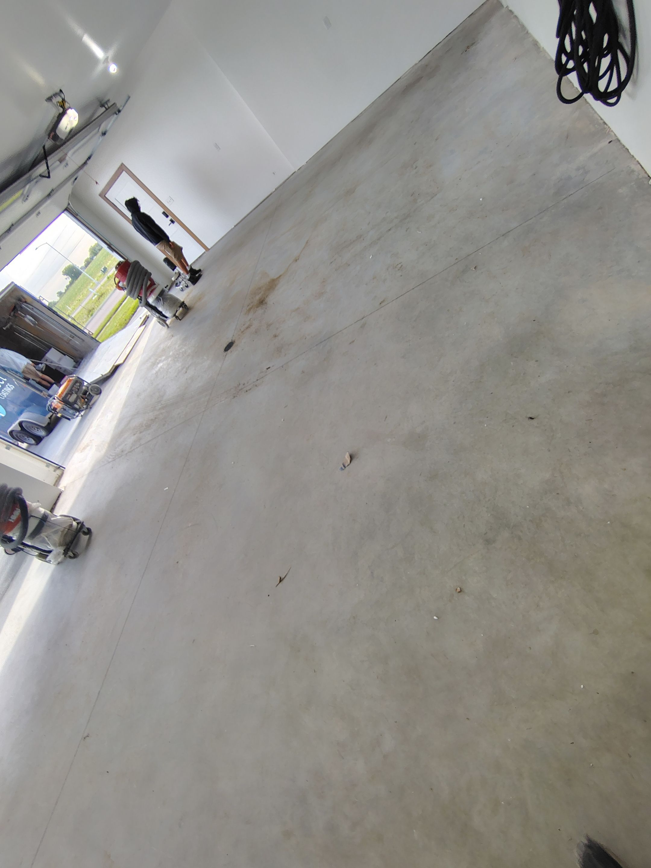Gray and White Speckled Epoxy Garage Floor Coating in Tea by Select Painting, Coatings & Garage Cabinets
