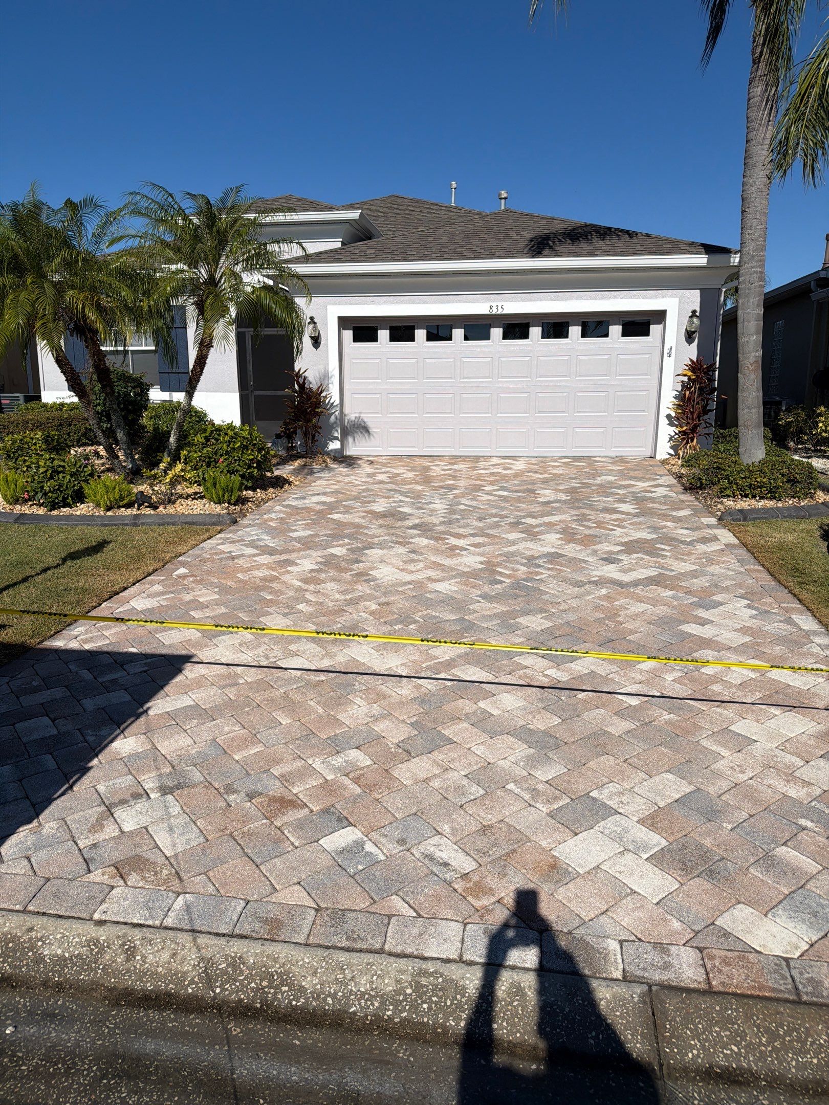 Herringbone Paver Driveway Repair, Stripping and Sealing in Sun City Center by Supreme Paver Experts