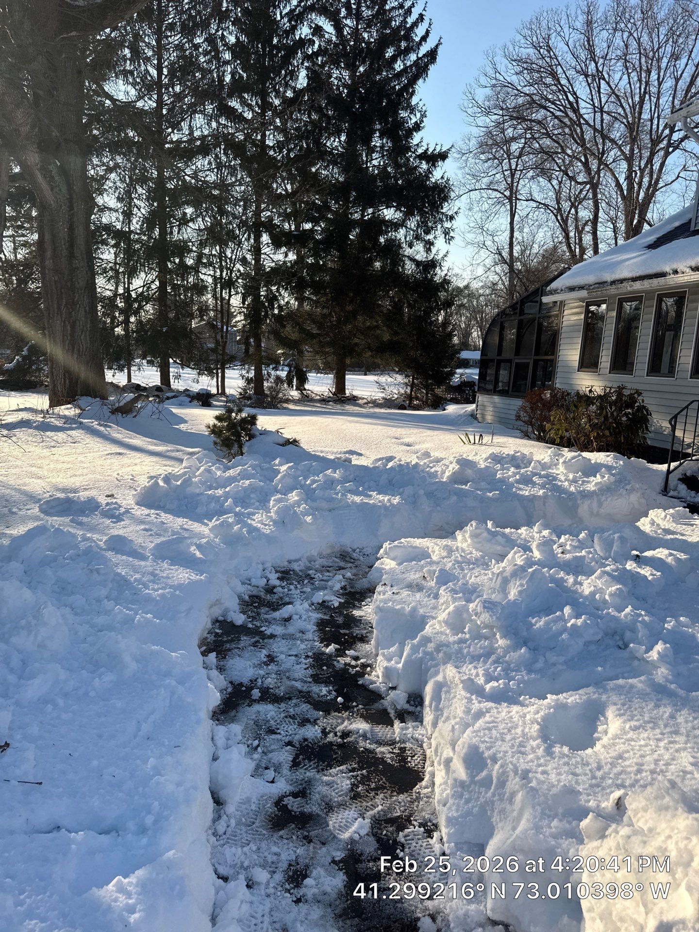 Asphalt Driveway Snow Clearing in Orange, CT by Diamond Image LLC