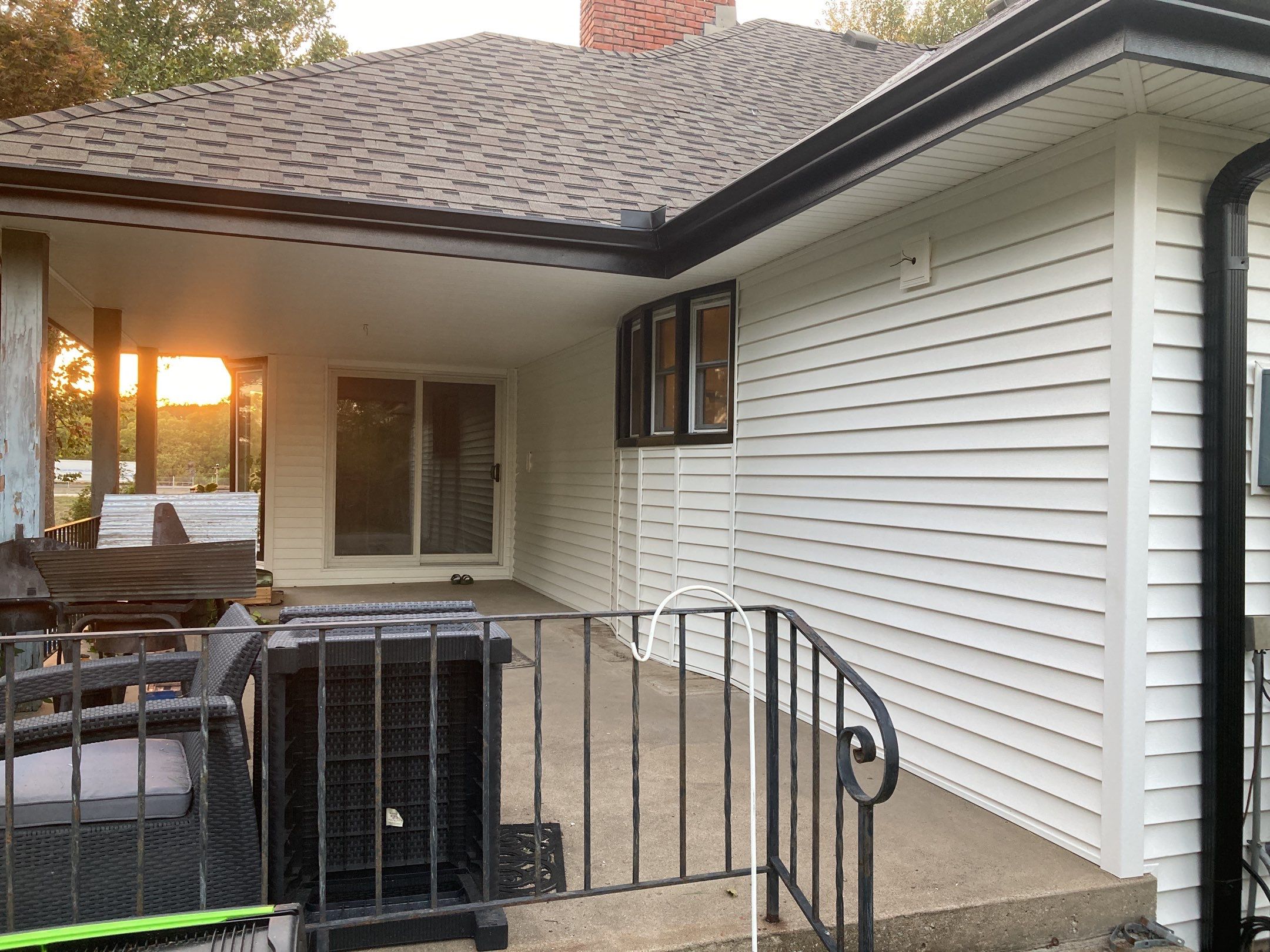 New white siding with Black trim by EEC  Windows, Siding & Roofing 