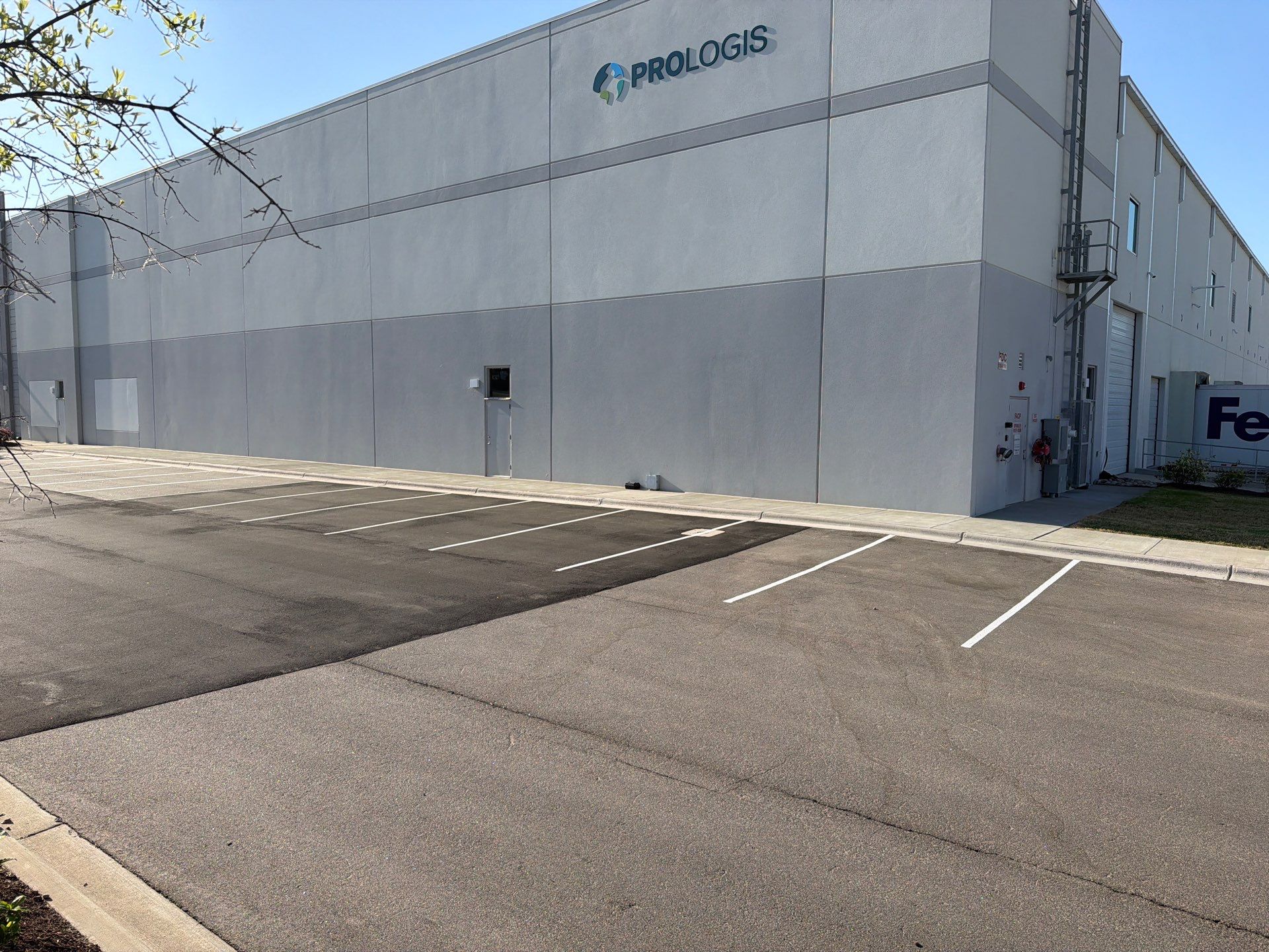 Exterior Commercial Improvements – Parking Lot & Wall Painting by Billy Weatherspoon Contractor