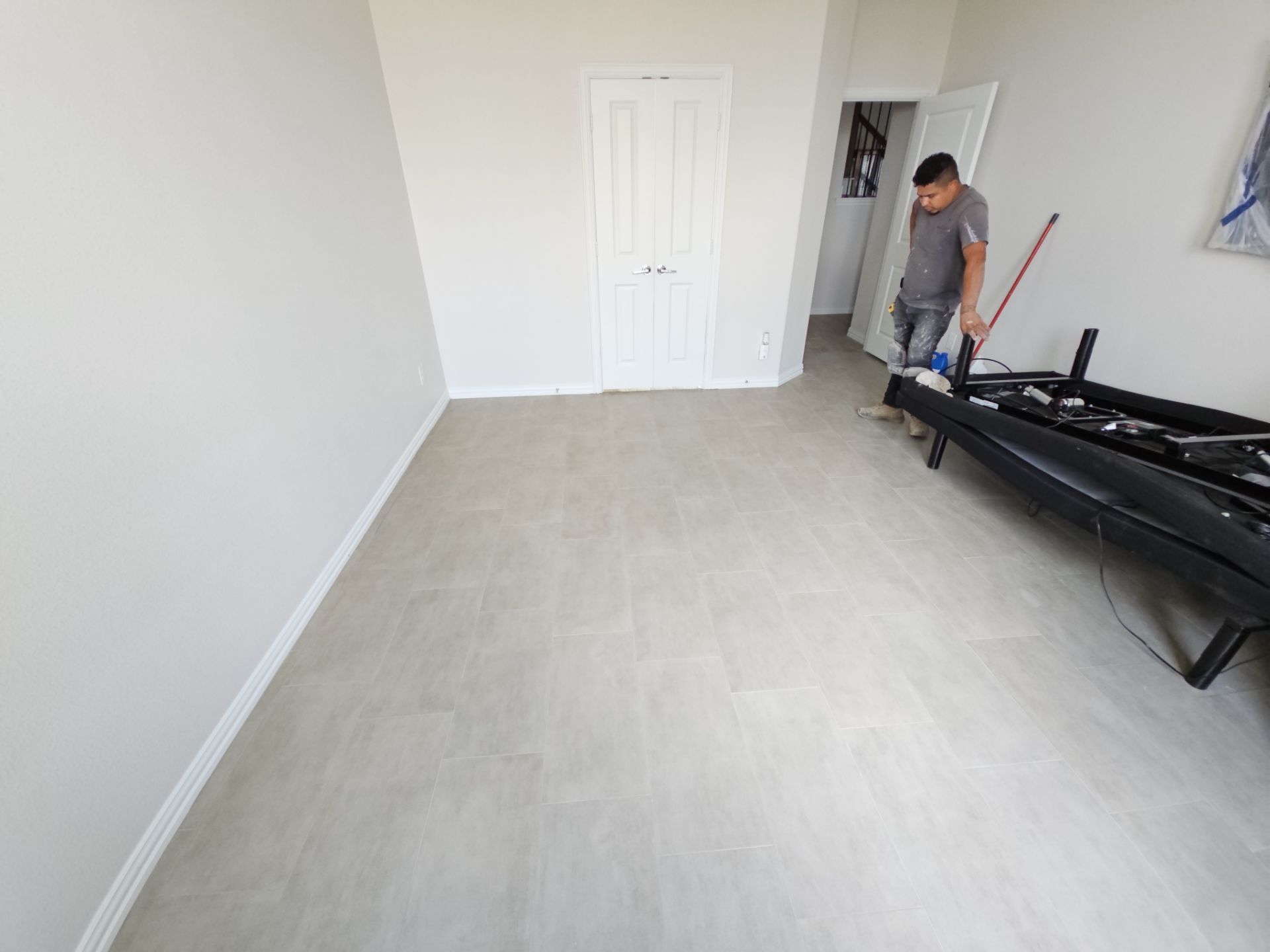 Carpet replacement with Tile and Red Oak Stairs by EL-GC LLC 