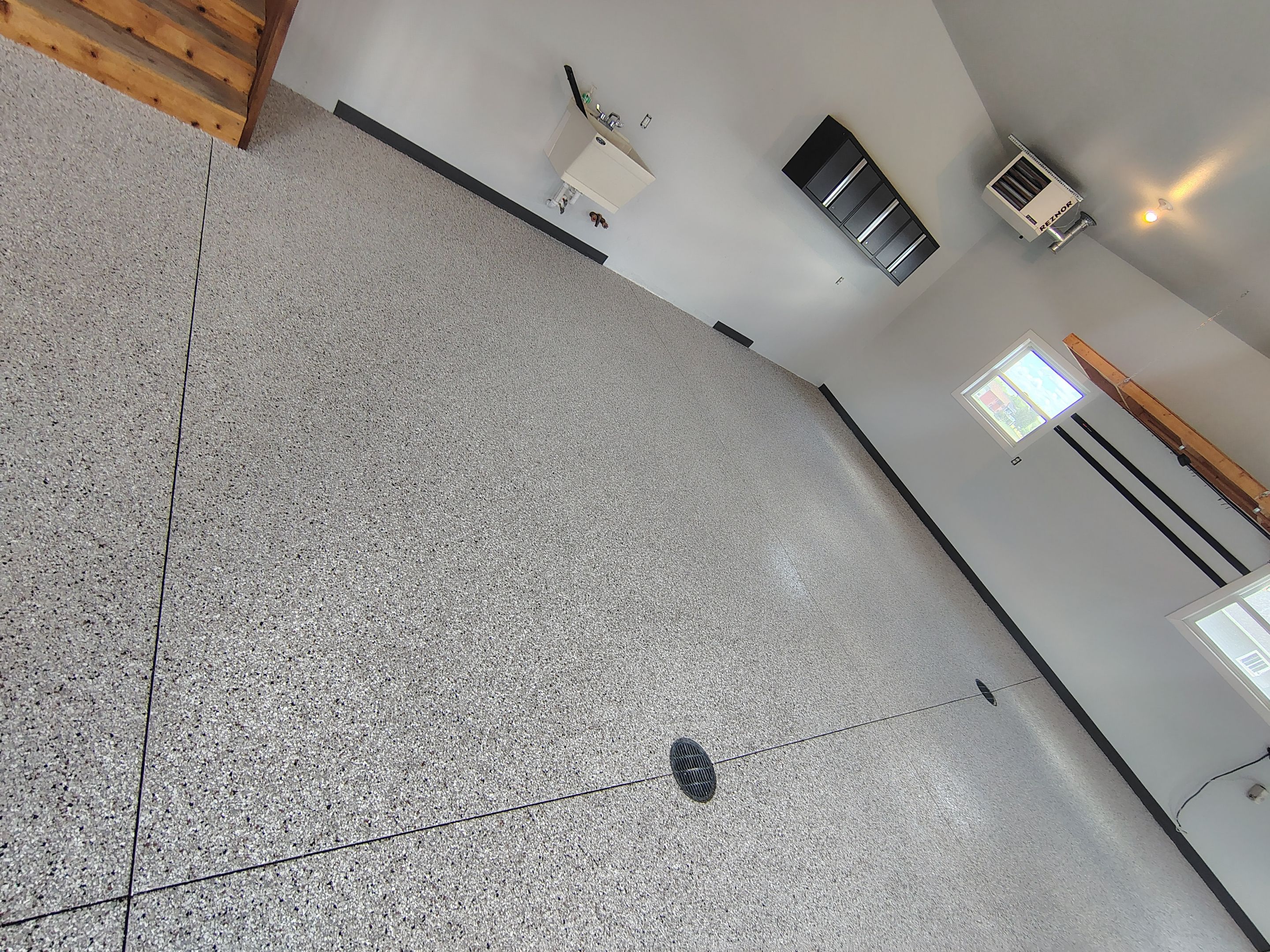 Multi-Car Garage Concrete Coating and Crack Repair in Dell Rapids by Select Painting, Coatings & Garage Cabinets