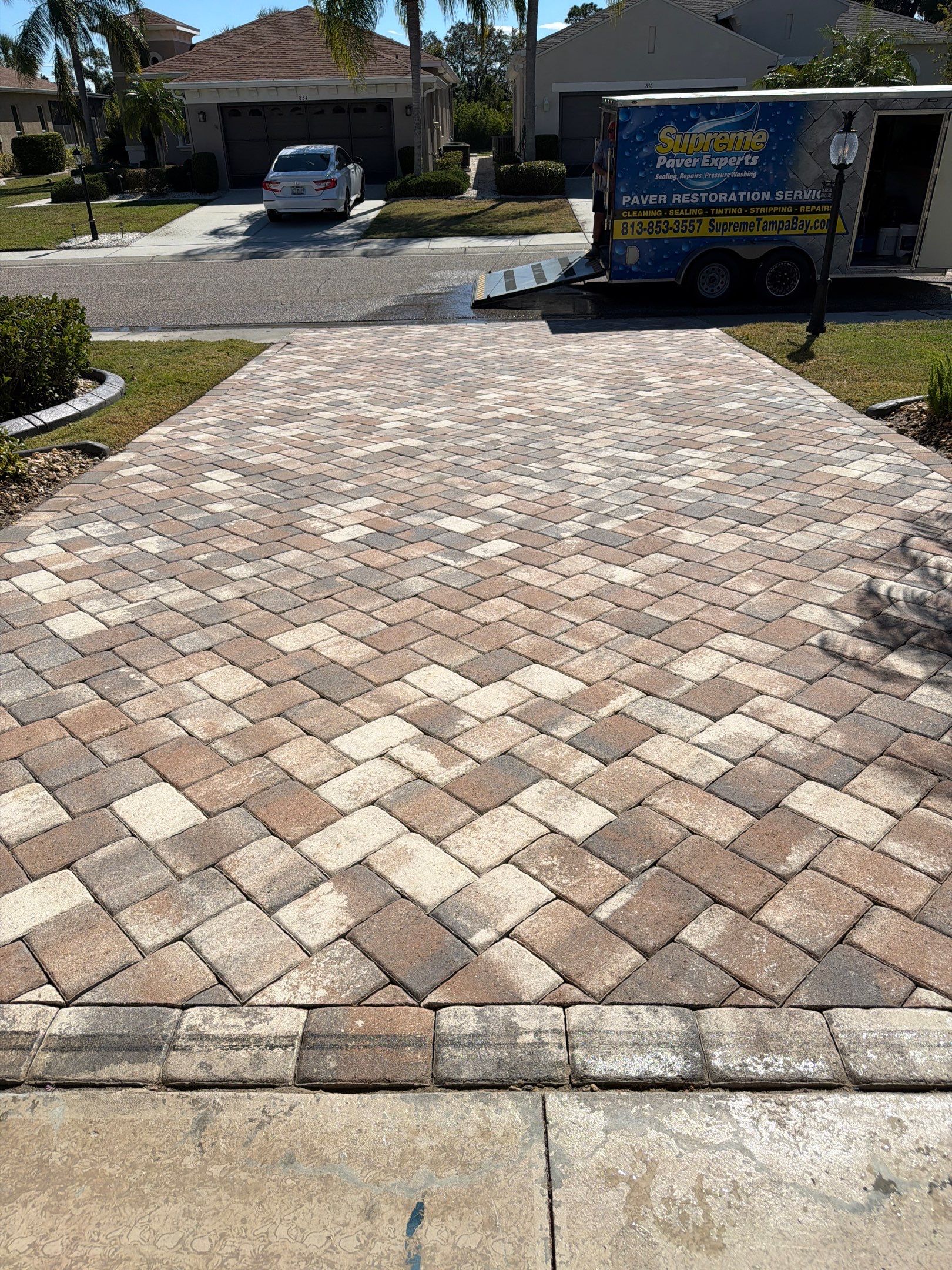 Herringbone Paver Driveway Repair, Stripping and Sealing in Sun City Center by Supreme Paver Experts