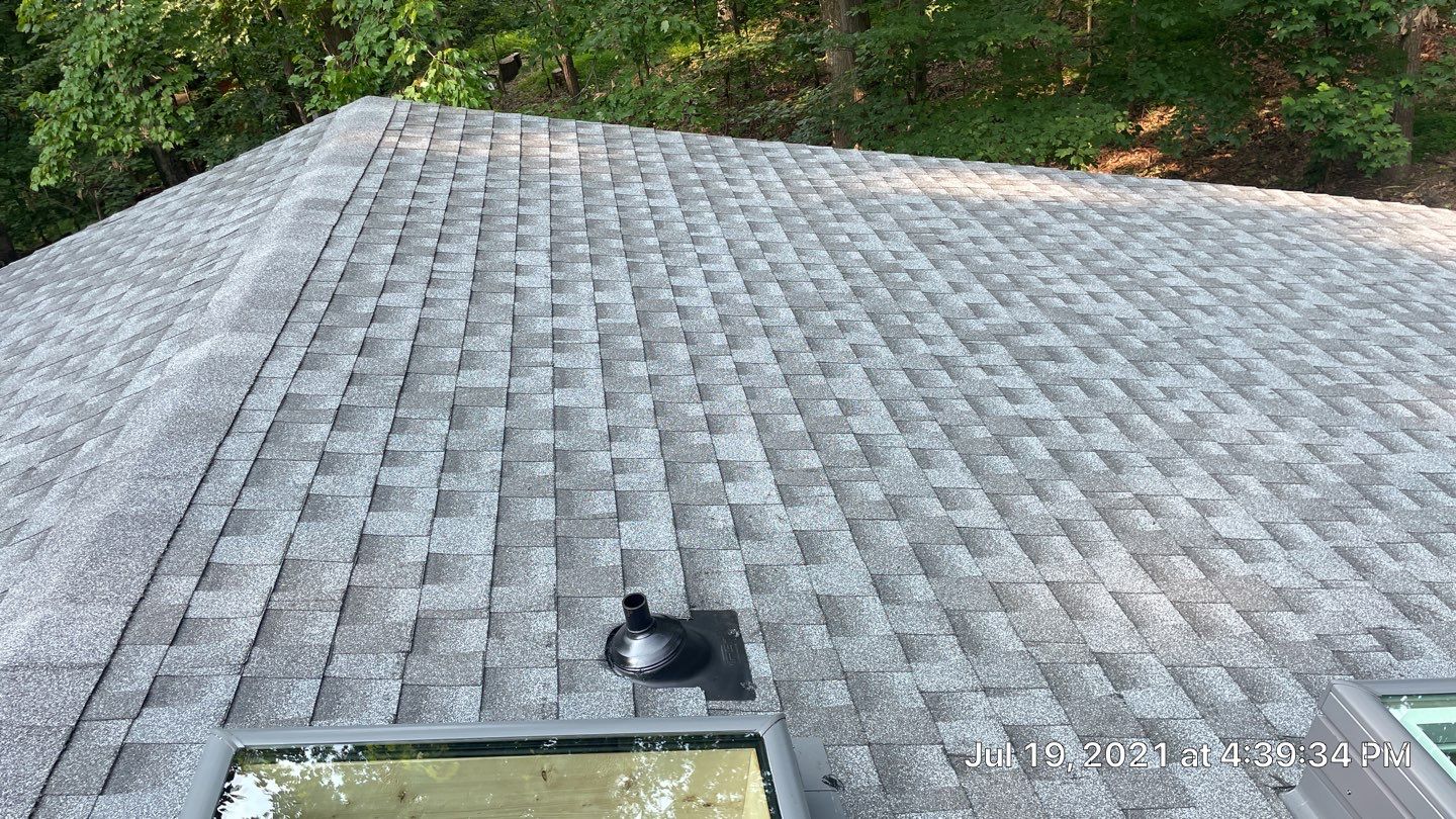 Deckhouse Roof Replacement by American Home Contractors