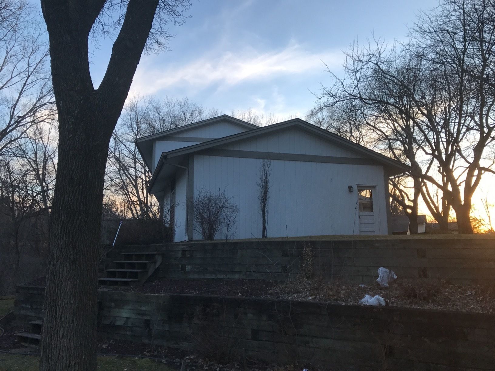 Siding Installation using LP SmartSide and Pella Vinyl Windows by MODERN EXTERIOR SYSTEMS