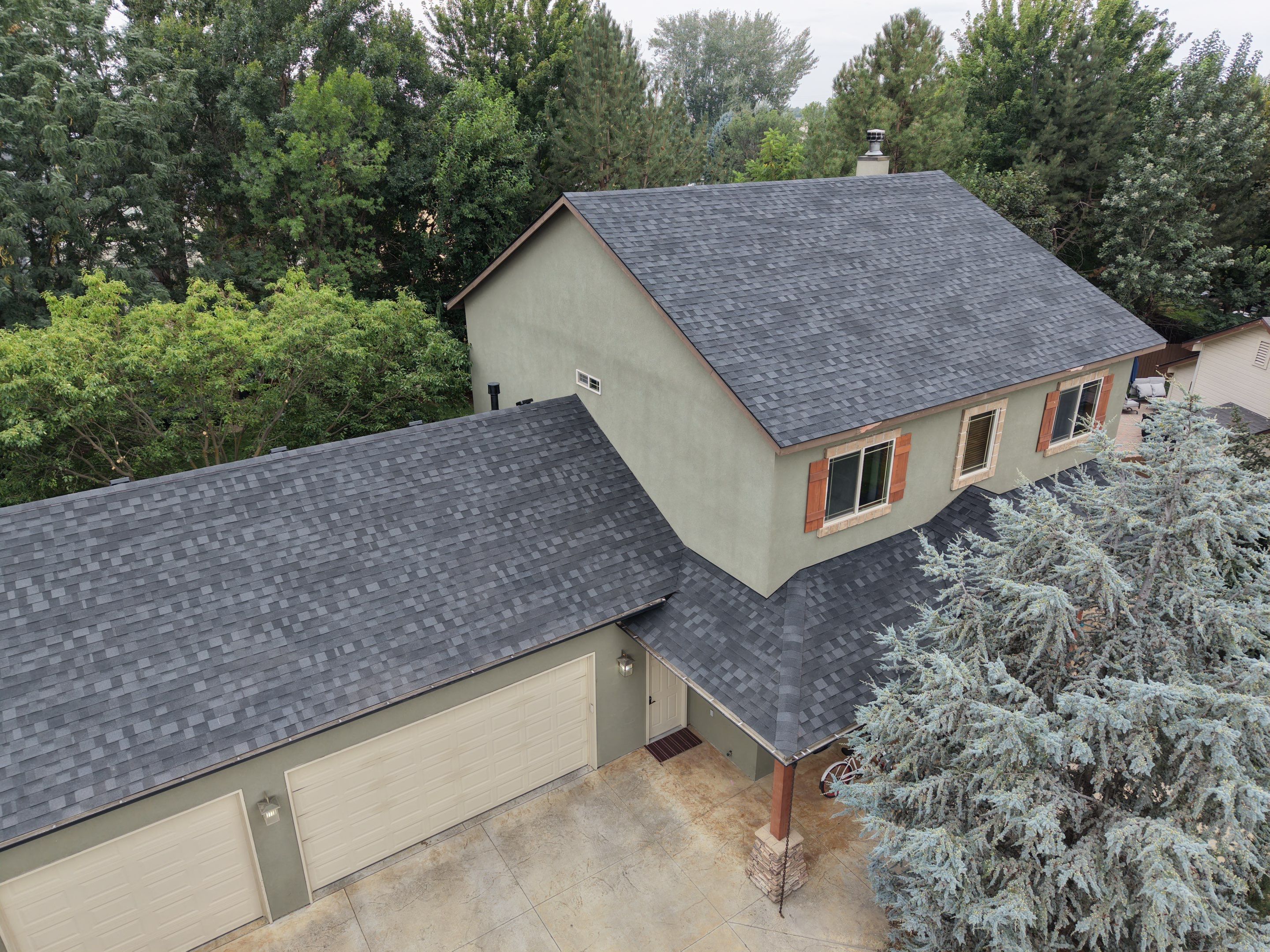 Residential Roof Replacement for Two-Story Stucco Home in Star by Olive Roofing