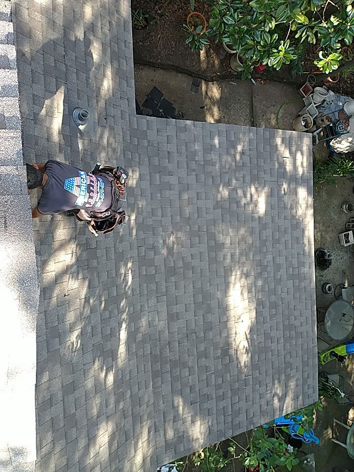 Residential Roofing Installation using Roof Replacement by American Roofing & Construction LLC