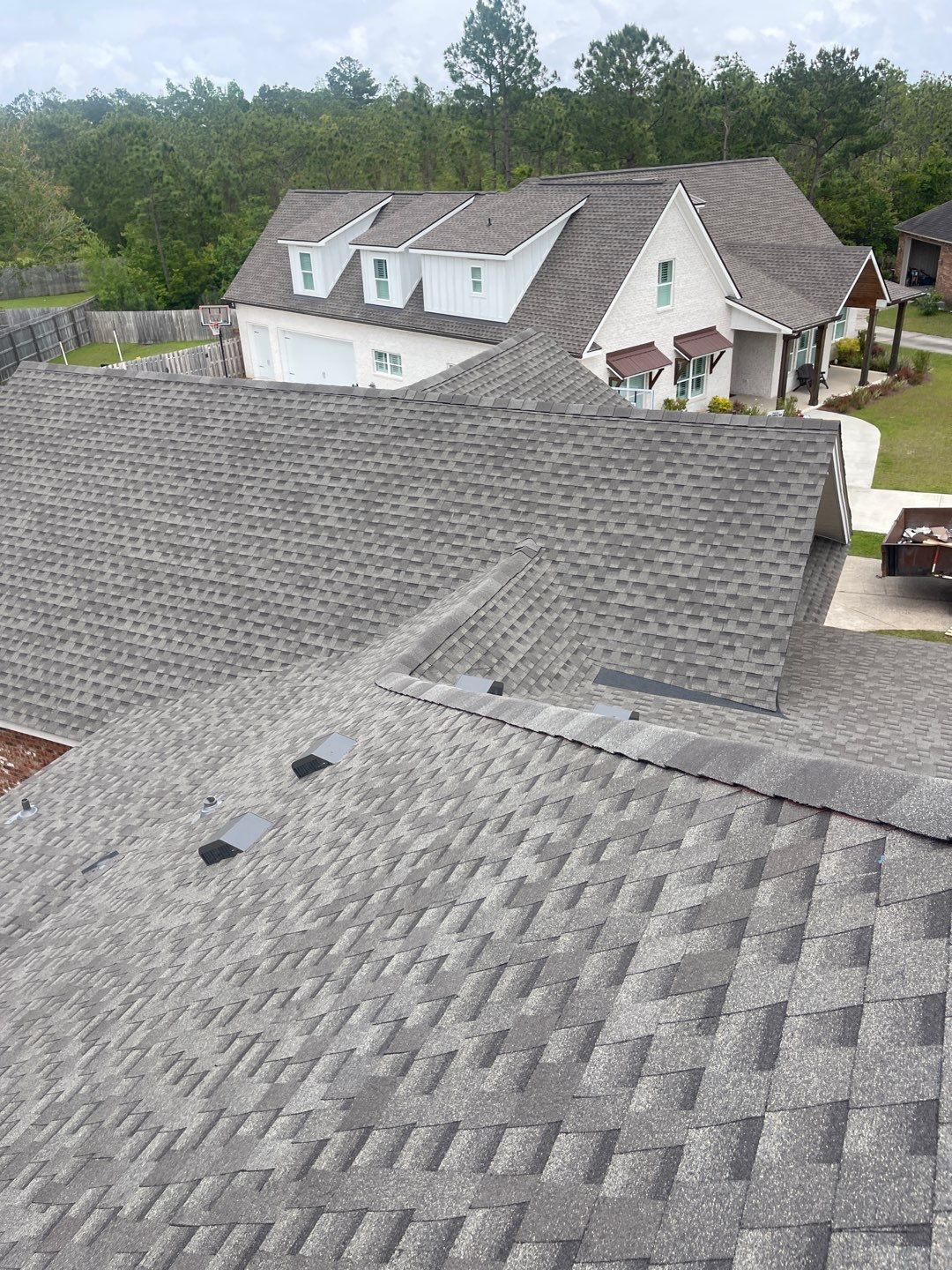 Residential Roofing Installation using Roof Replacement by American Roofing & Construction LLC