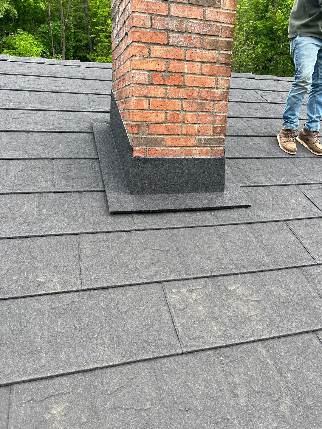 Residential Roofing Repair using Chimney counter flashing by Nitro Roofing and Construction