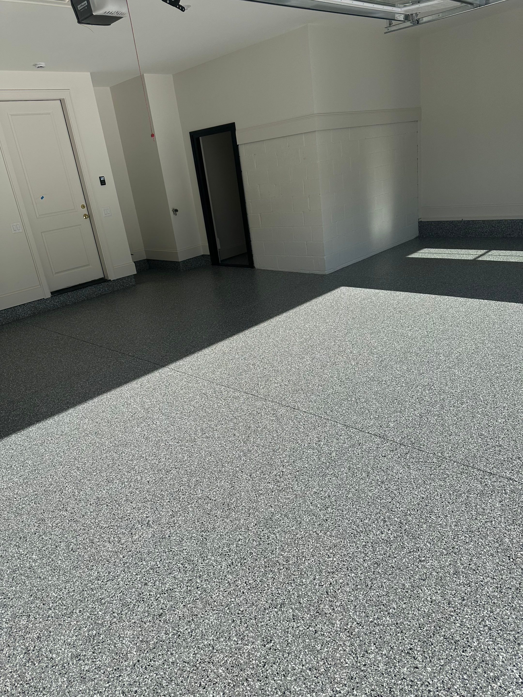 Garage Floor Coating using Wombat by My Garage Floor Guys