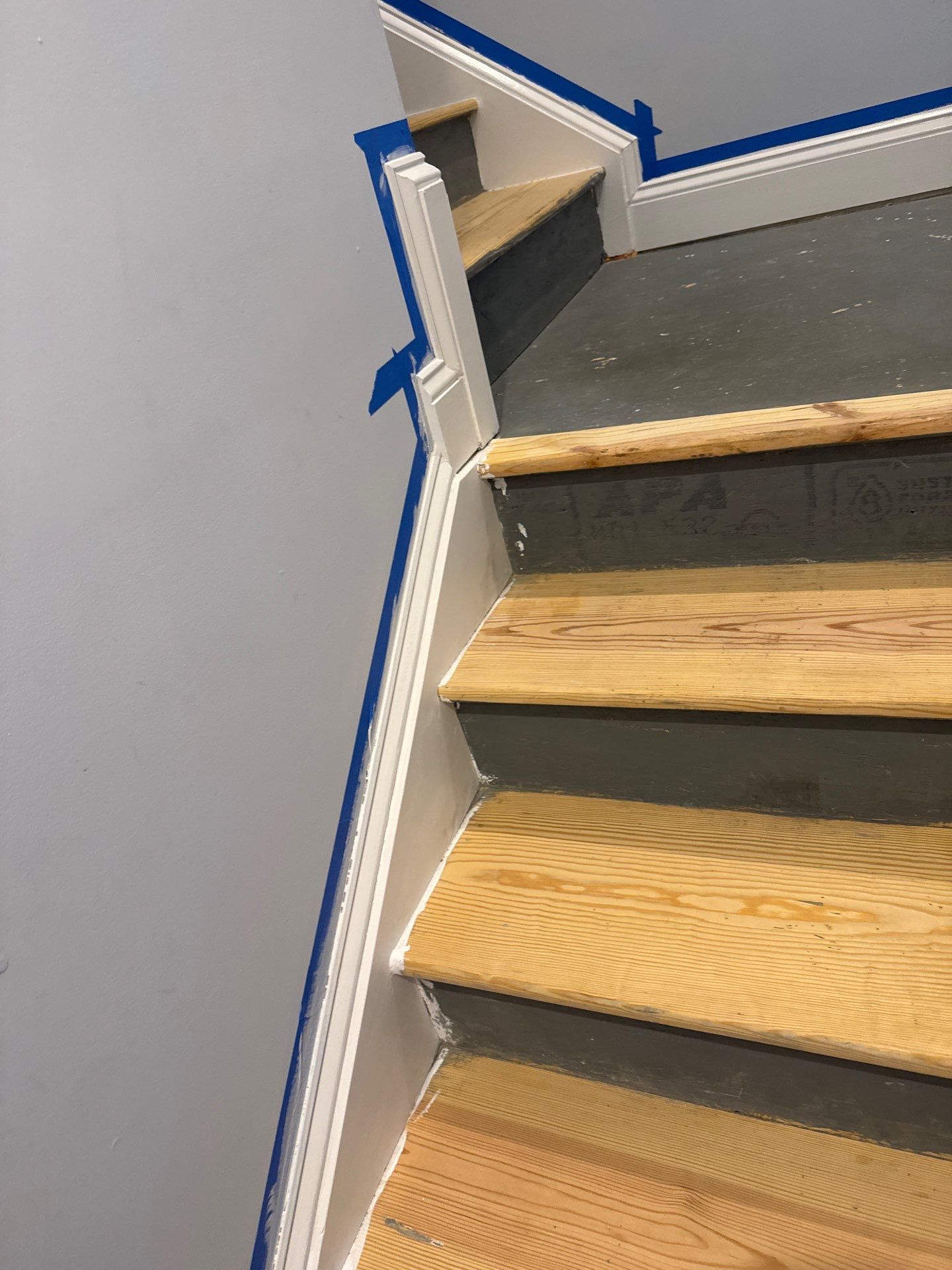 Stairway Installation using t vinyl stair tread and reversibleriser by La Bendicion Contruction Llc