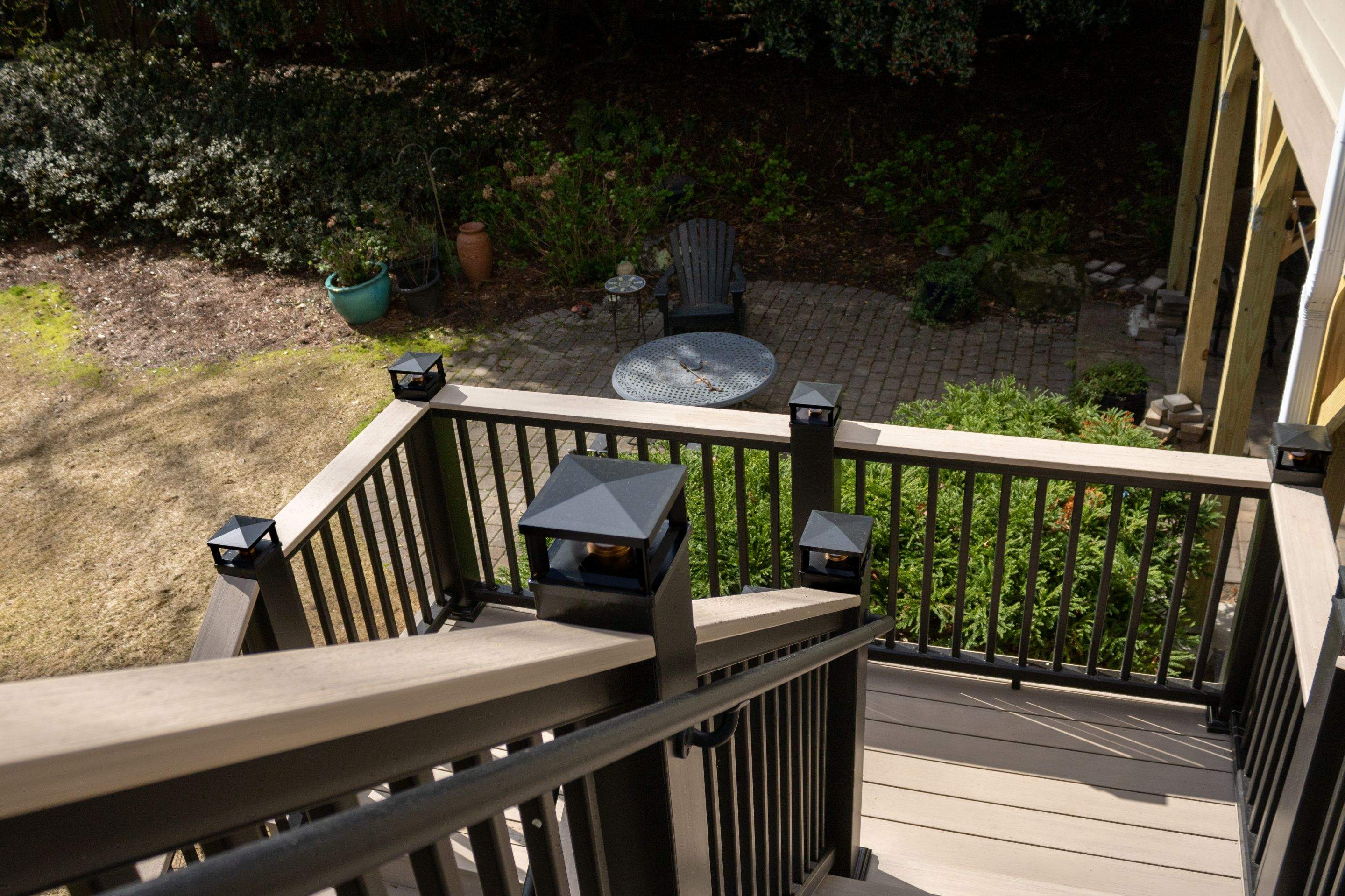 Deck Resurface and Screened-In Porch Build with Timbertech LED Lantern Post Cap Lights by Nelson Exteriors