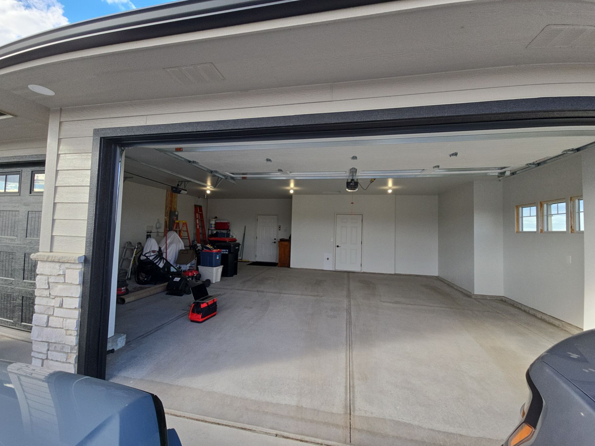 High-Gloss Epoxy Flake Garage Floor Coating in Brandon by Select Painting, Coatings & Garage Cabinets