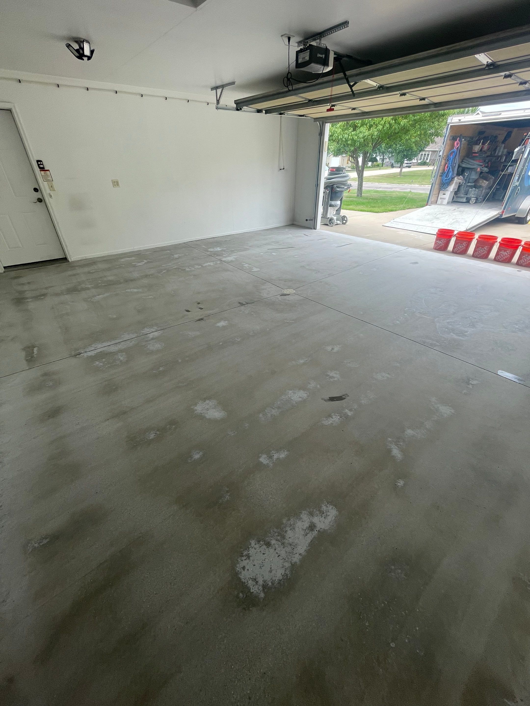 Coyote Flake Garage Floor Coating in Worthington, Minnesota by Select Painting, Coatings & Garage Cabinets