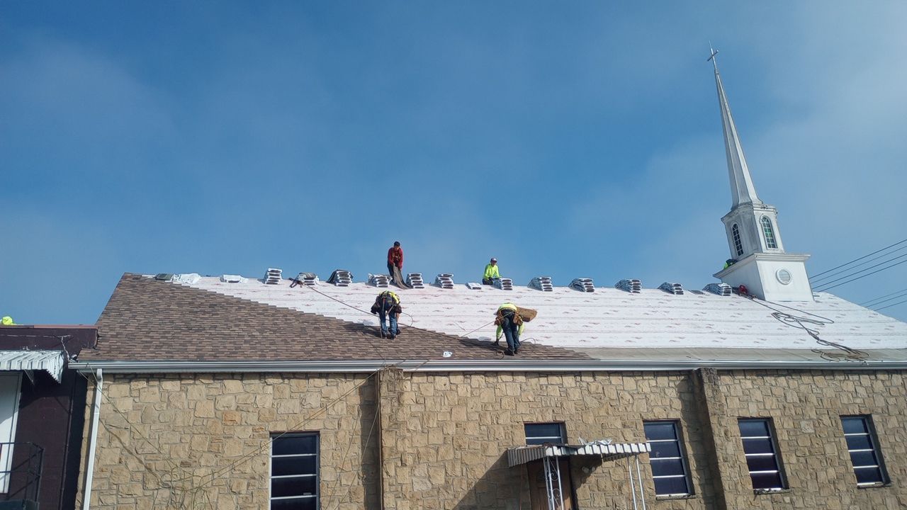 Commercial Roofing Installation using Performance Shingles by Mr. Roofer