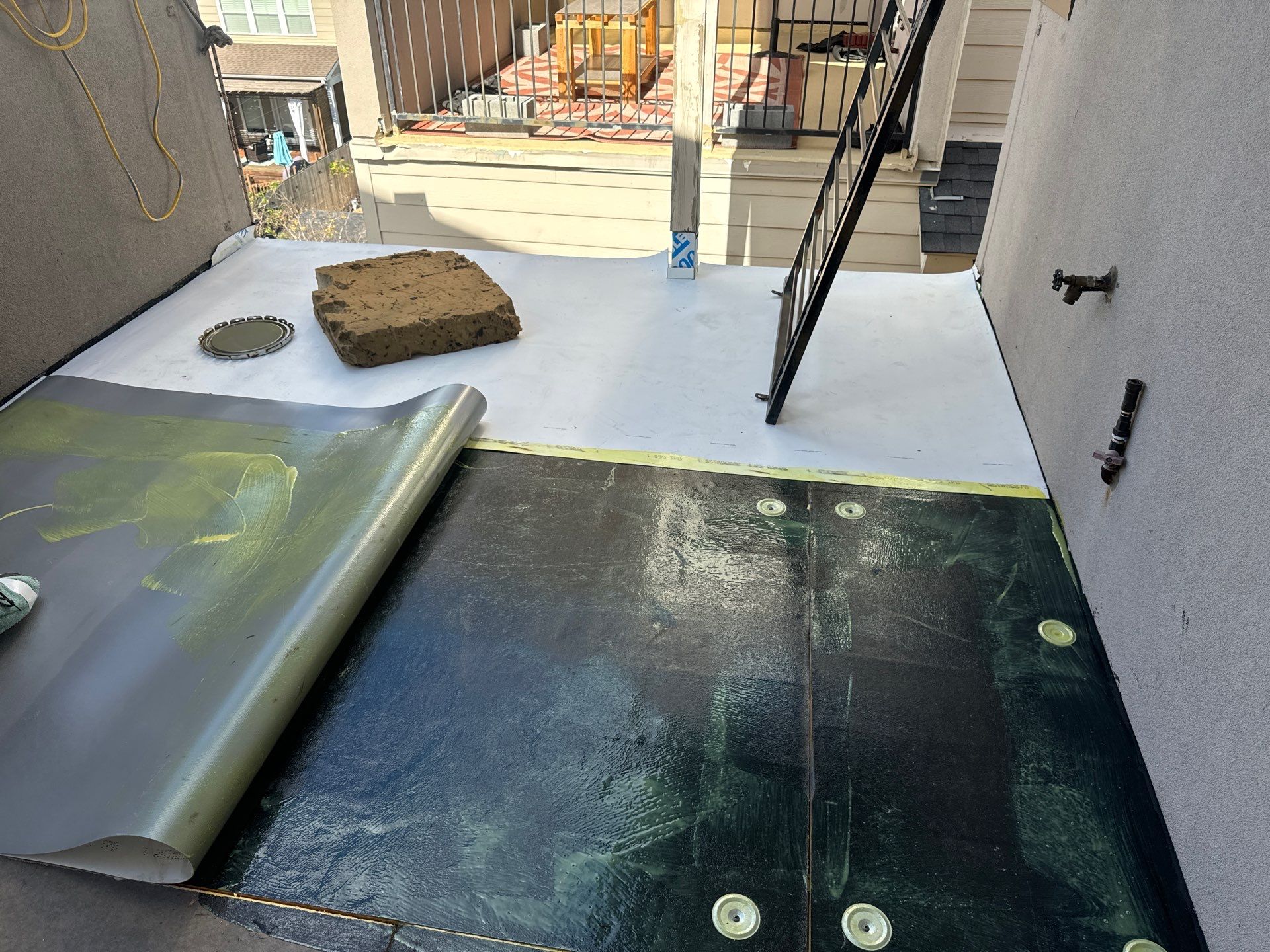 Rooftop Patio Installation by Associates Roofing Unlimited 