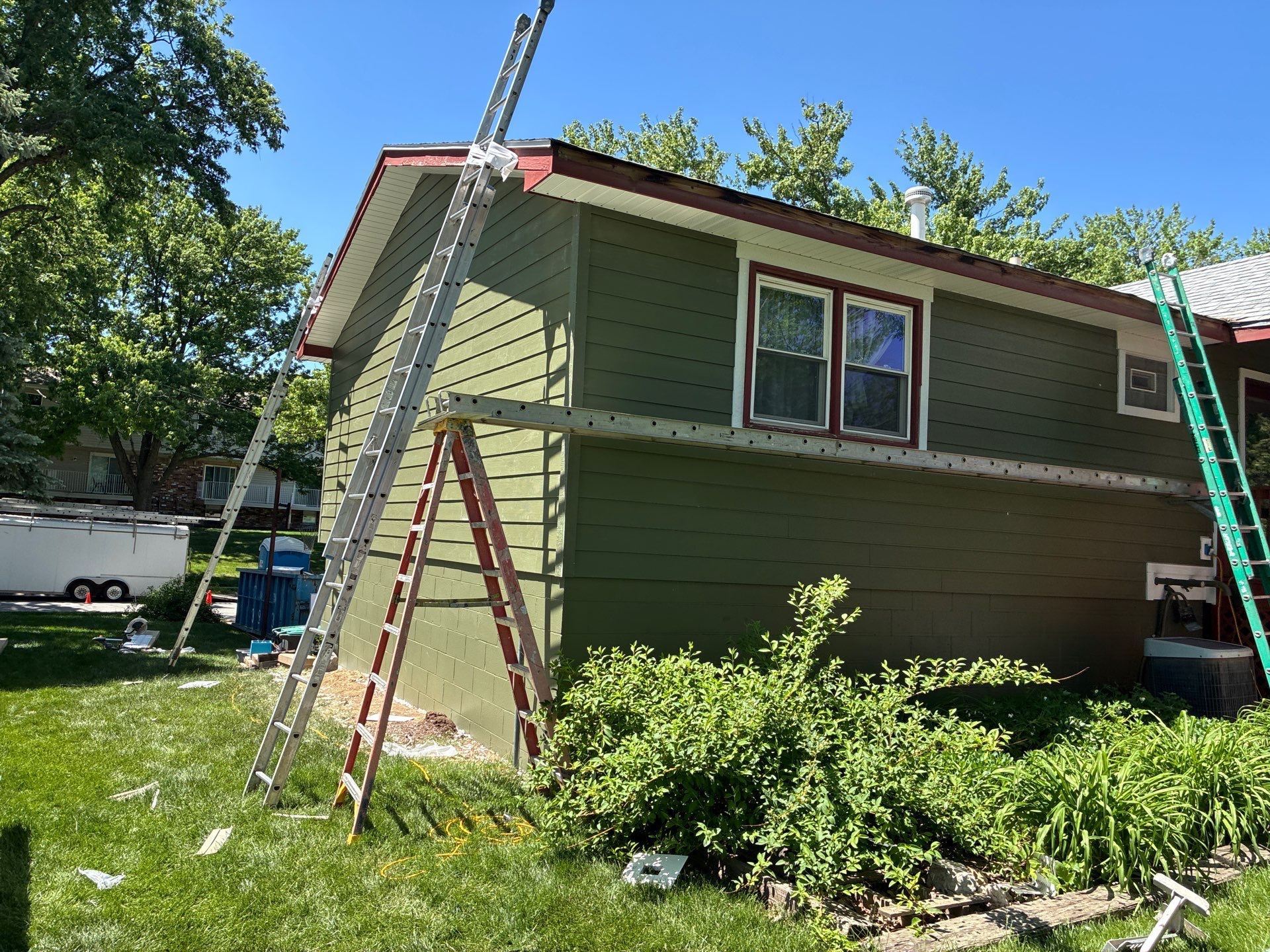 James Hardie Siding Replacement in Omaha with Mountain Sage Finish by Carps Complete Exteriors
