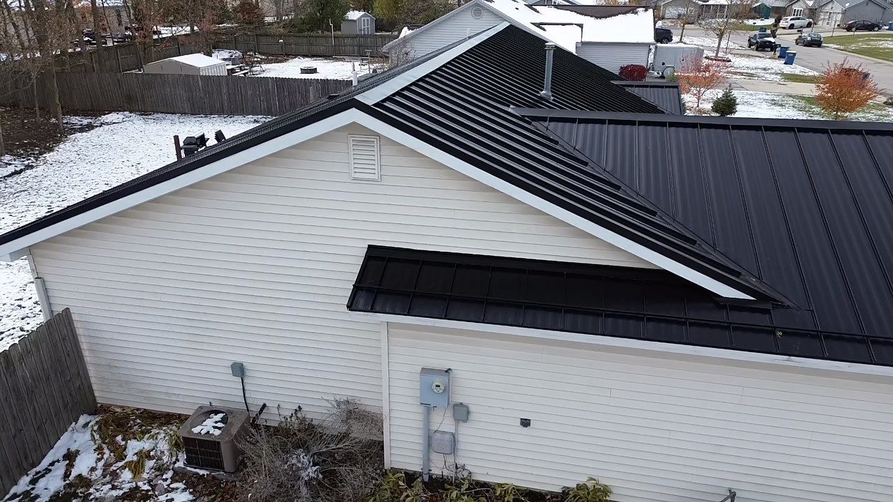 Mechanically Seamed Standing Seam Roof in Ossian, Indiana with Black Finish by 4Ever Metal Roofing