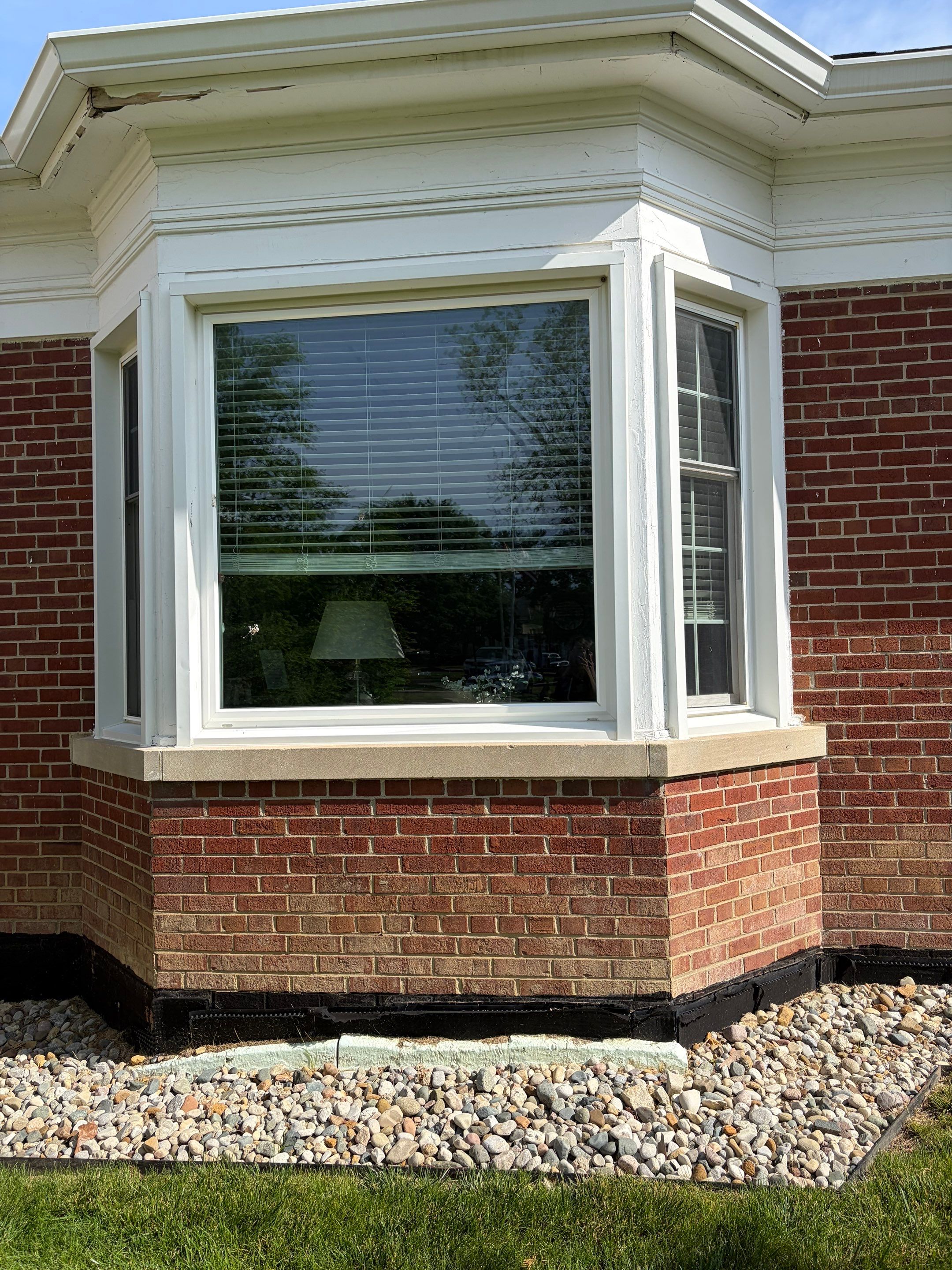 Commercial Wood Trim Restoration and Gutter Replacement in Birmingham by Top Shelf Painter