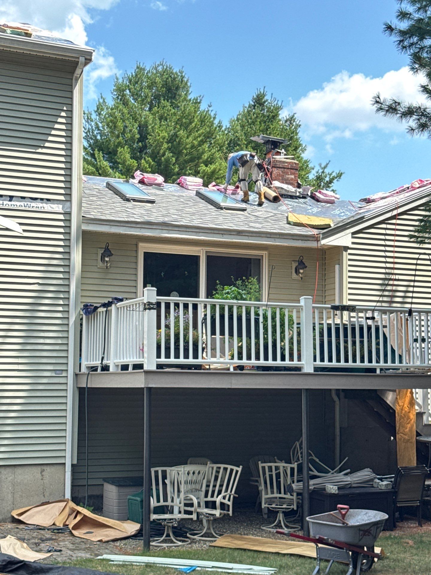 Complete Roof Replacement with Chimney Flashing, Gutter Guard System, and Vinyl Siding Repairs by Mighty Dog Roofing of Greater Middlesex County
