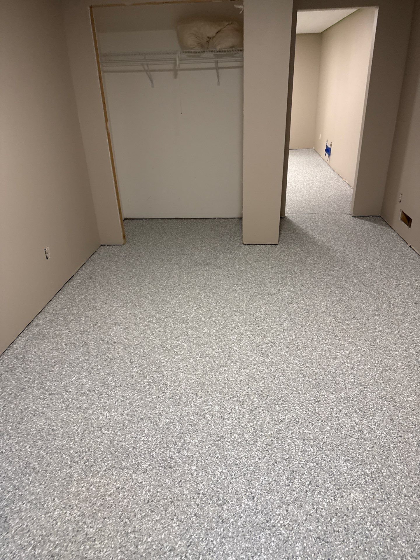 Basement Concrete Coating with Speckled Flake Finish in Elkhart by Revival Concrete Coatings
