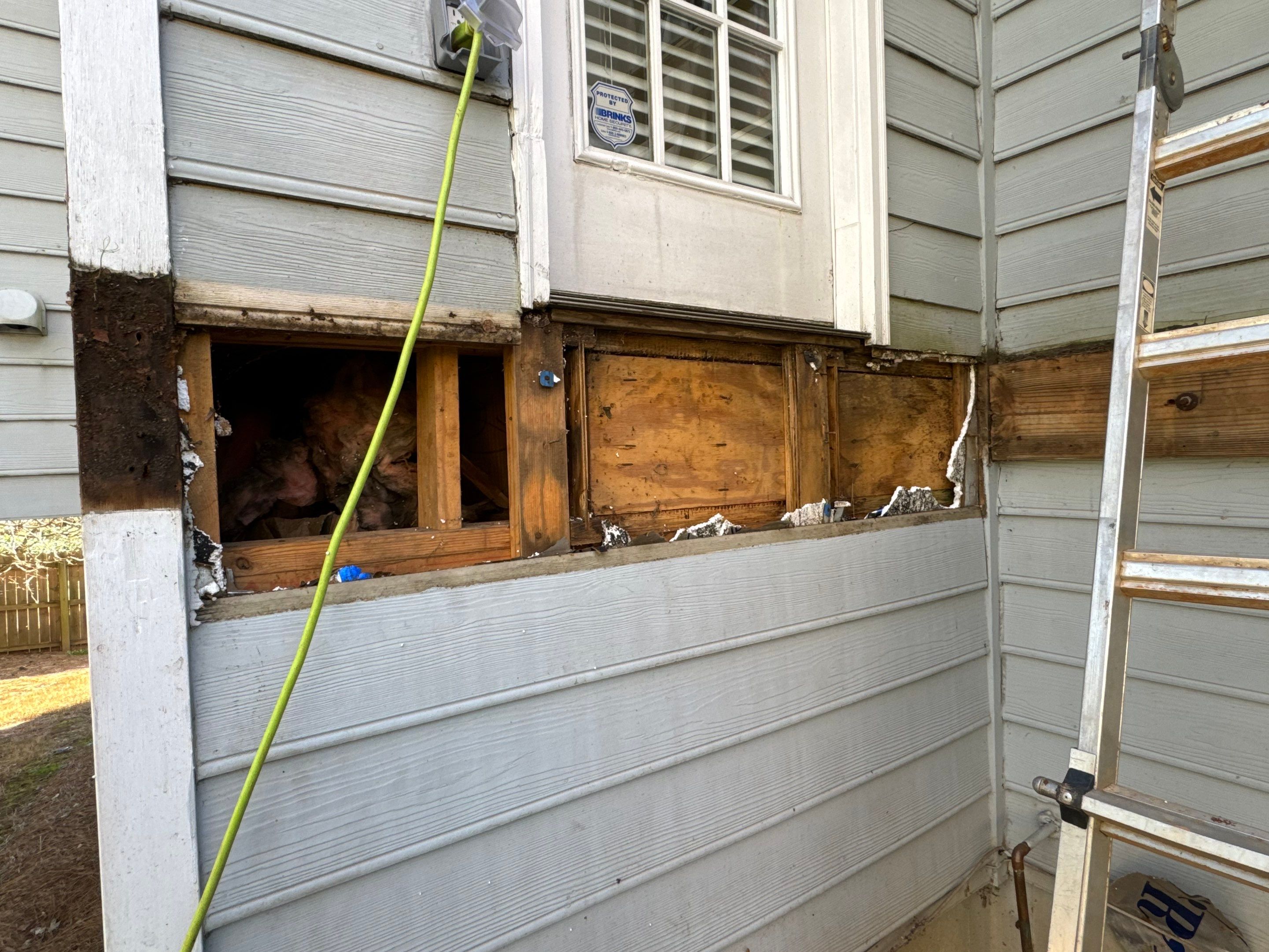 Elevated Deck Replacement with Black Metal Railings in Johns Creek by Swift Home Renovations