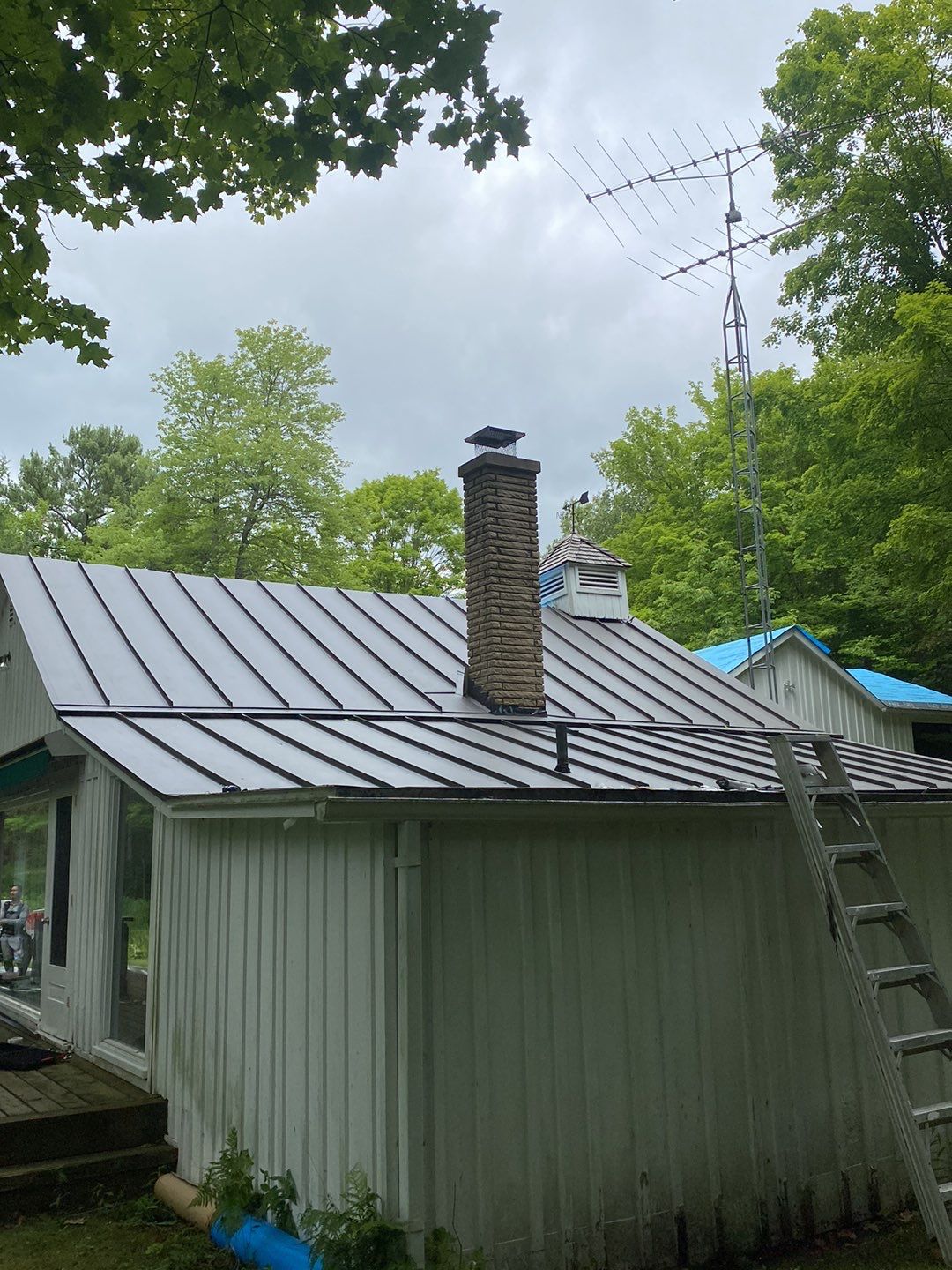Residential Roofing Installation using 24 Ga Standing Seam Meta by Jay Carter Roofing & Sheet Metal
