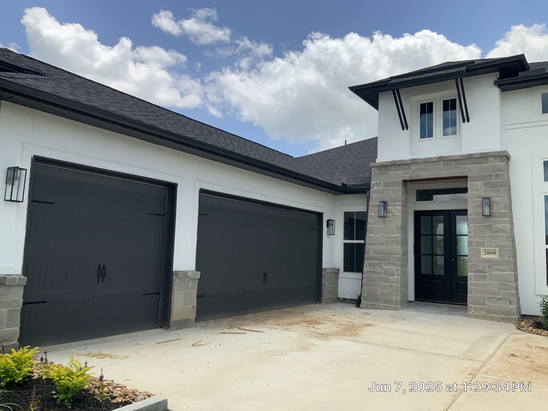 Waller Sophistication: Snowbound Color Stucco with Limestone Accents. by Apex Conventional Stucco Llc