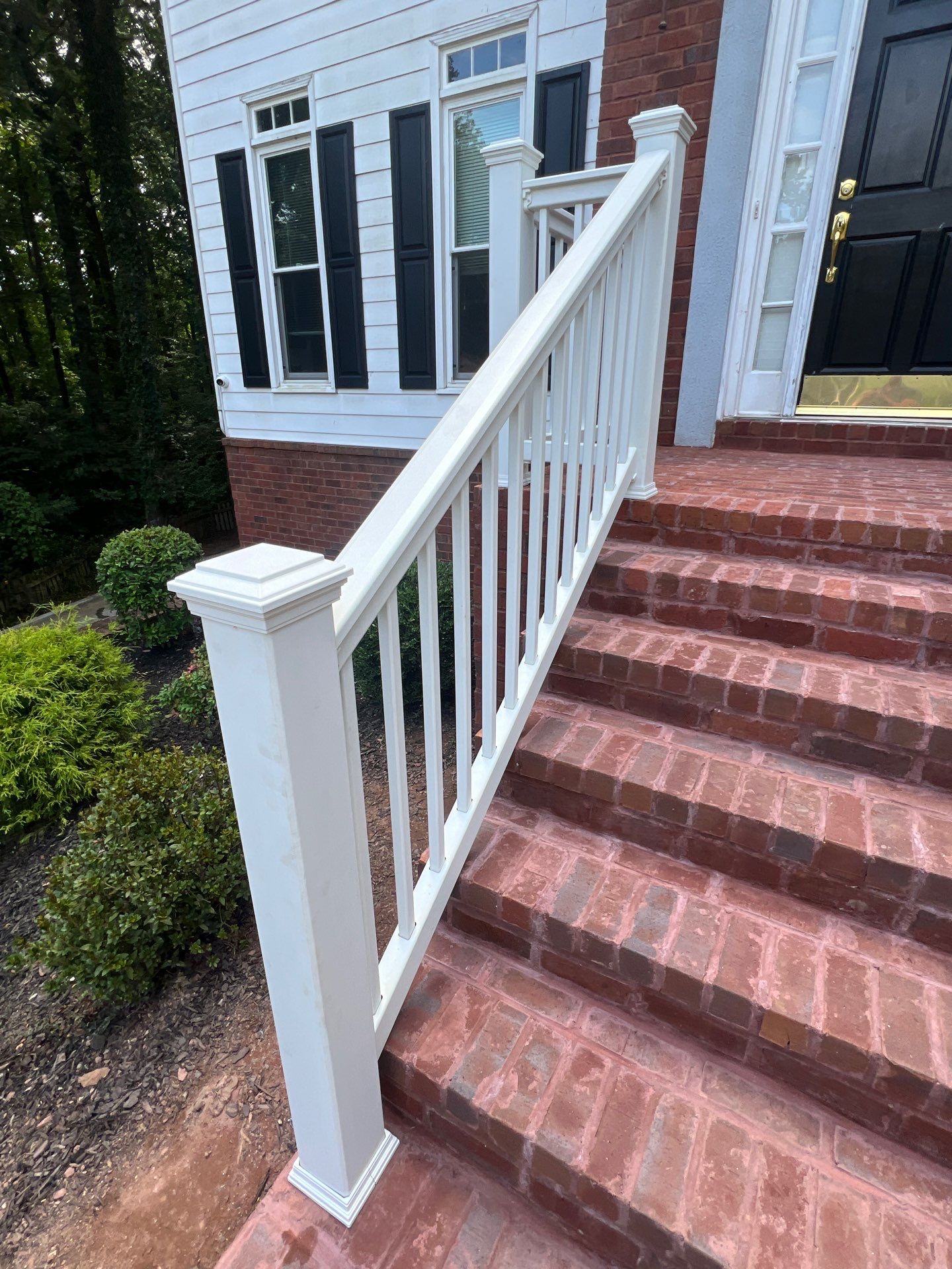 Front Porch Railing Replacement using Trex White Composite Railing by Nelson Exteriors