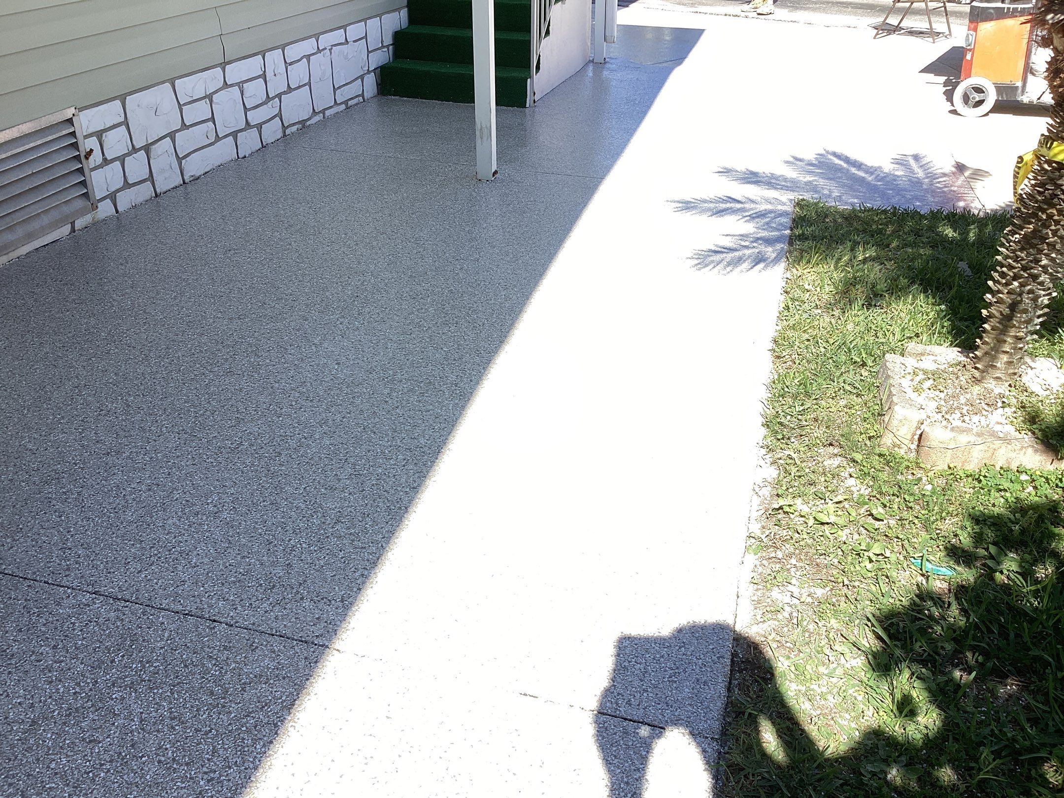 Driveway using Mt Everest by Amvet concrete coatings llc