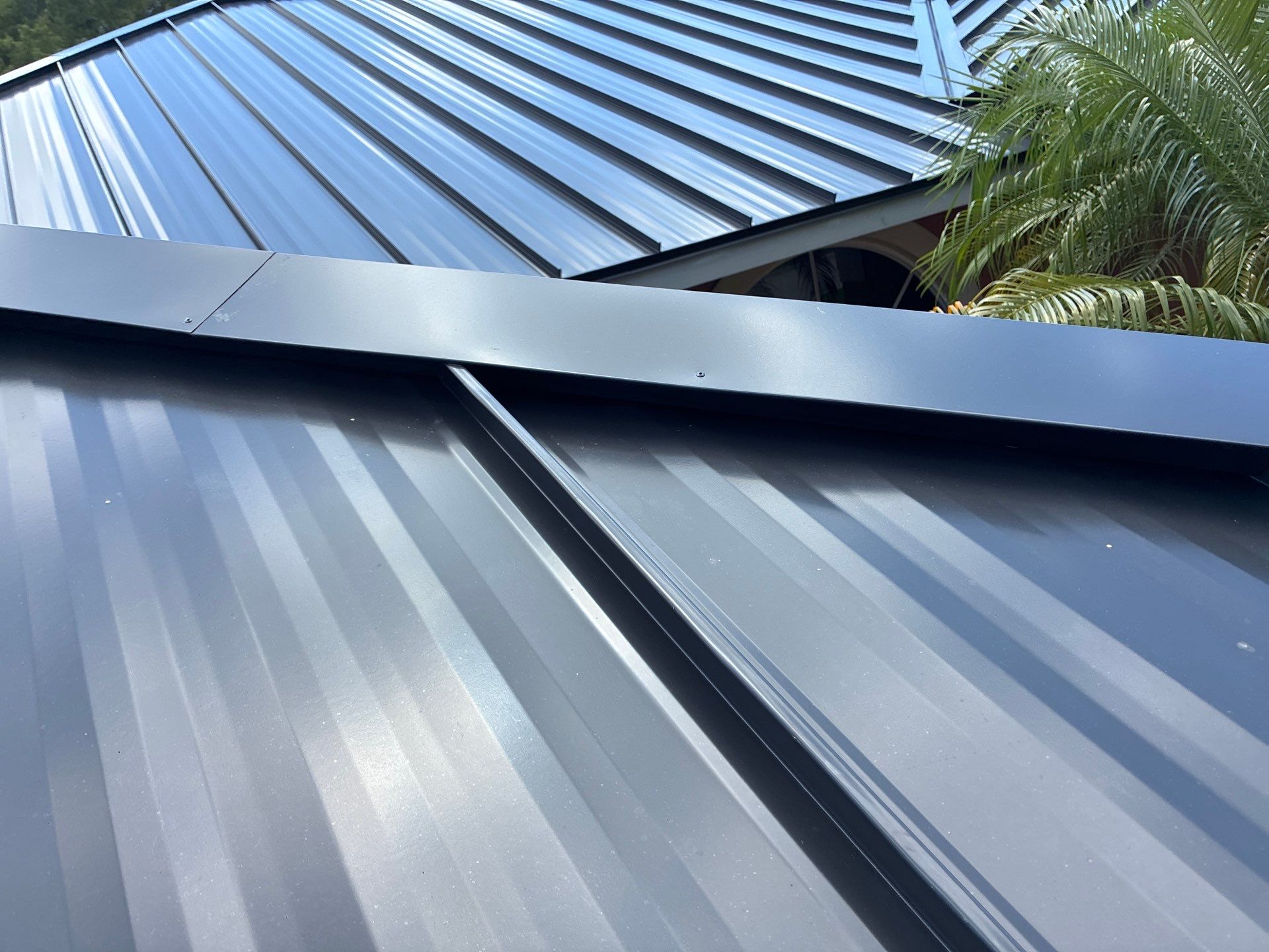 24ga 1.5" Mechanical Seam Matte Black by Total Roofing System The Metal Roof Experts