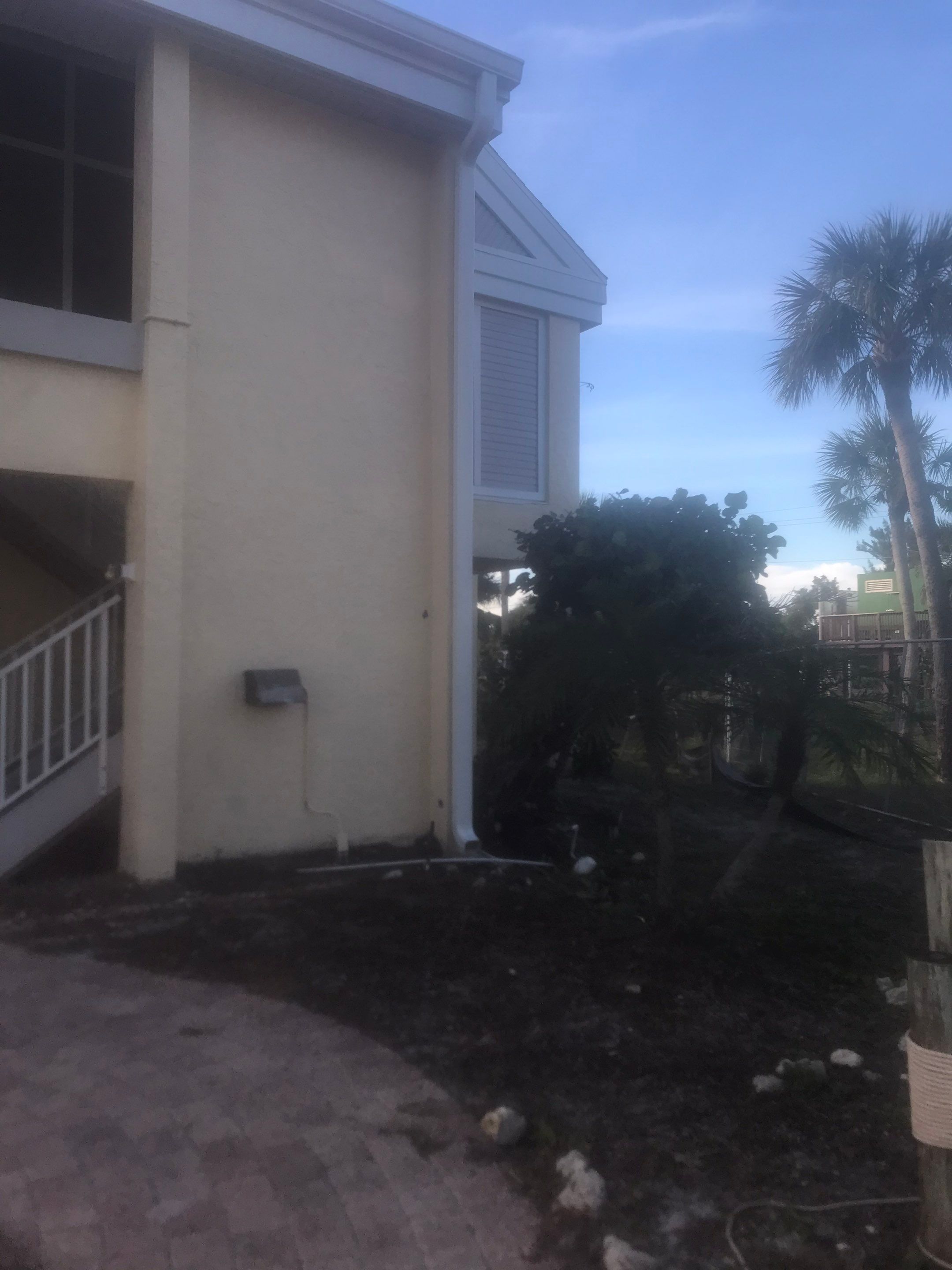 K-Style Seamless Gutter Installation using White Seamless Gutters in Sanibel FL by Gutter Professors