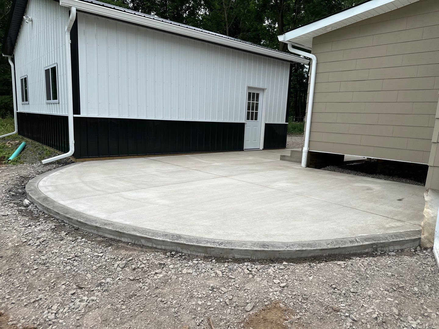 Broom finished concrete patio and sidewalk  by NG Masonry & Construction LLC