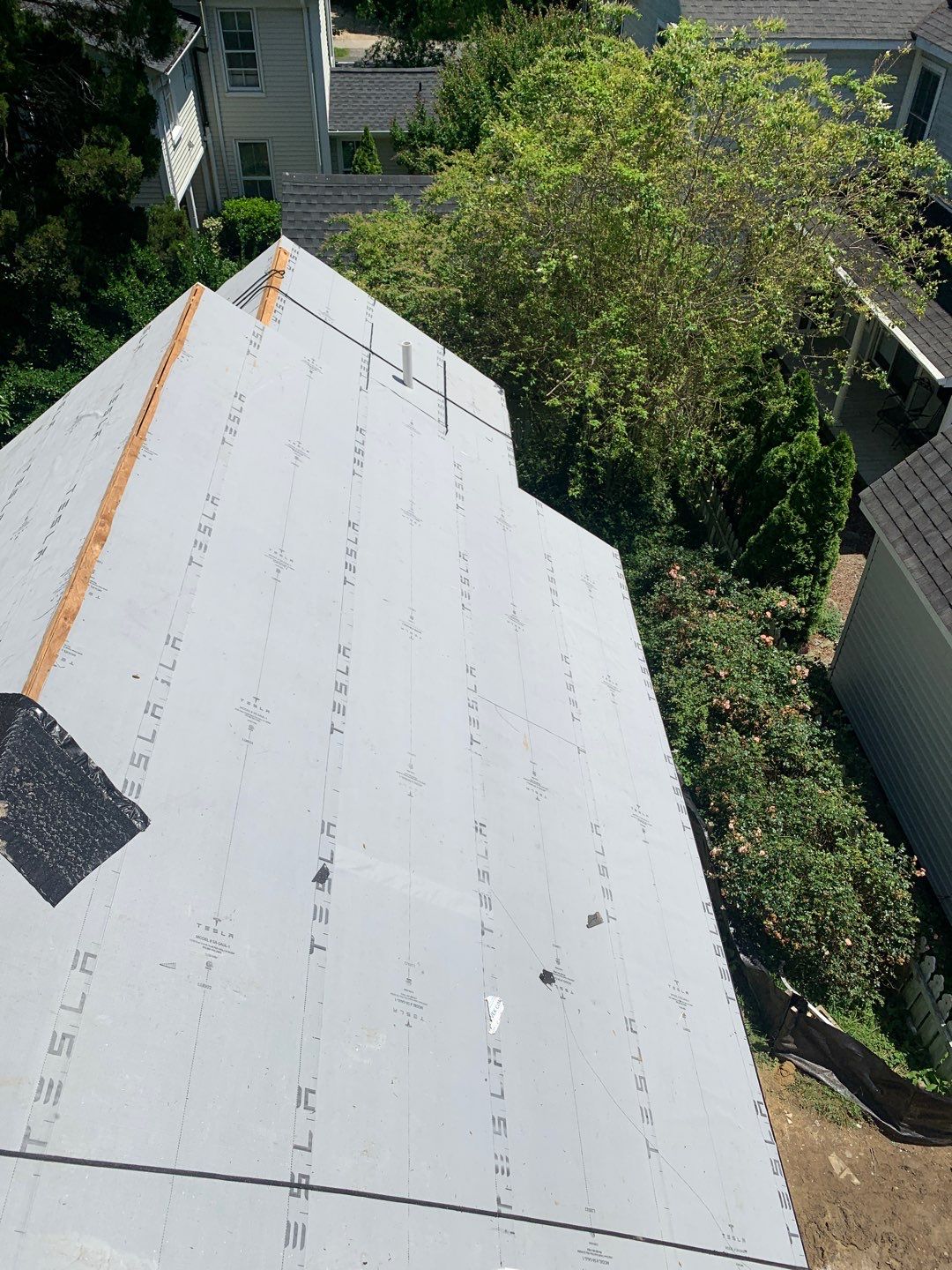 Tesla Solar Roof  using Tesla Powerwall in MD by American Home Contractors