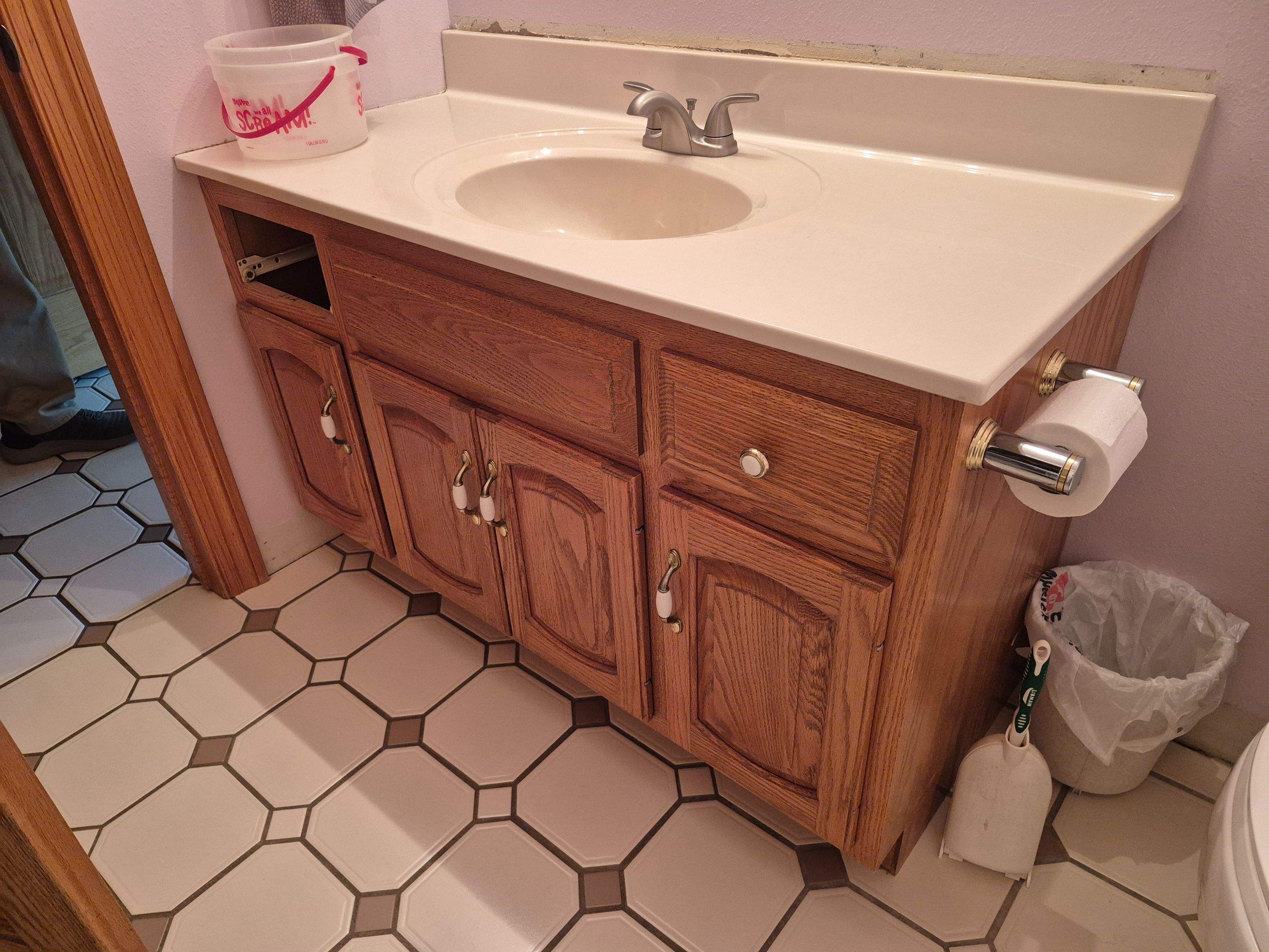 Kitchen Cabinet Painting and Hardware Update in Sioux Falls by Select Painting, Coatings & Garage Cabinets