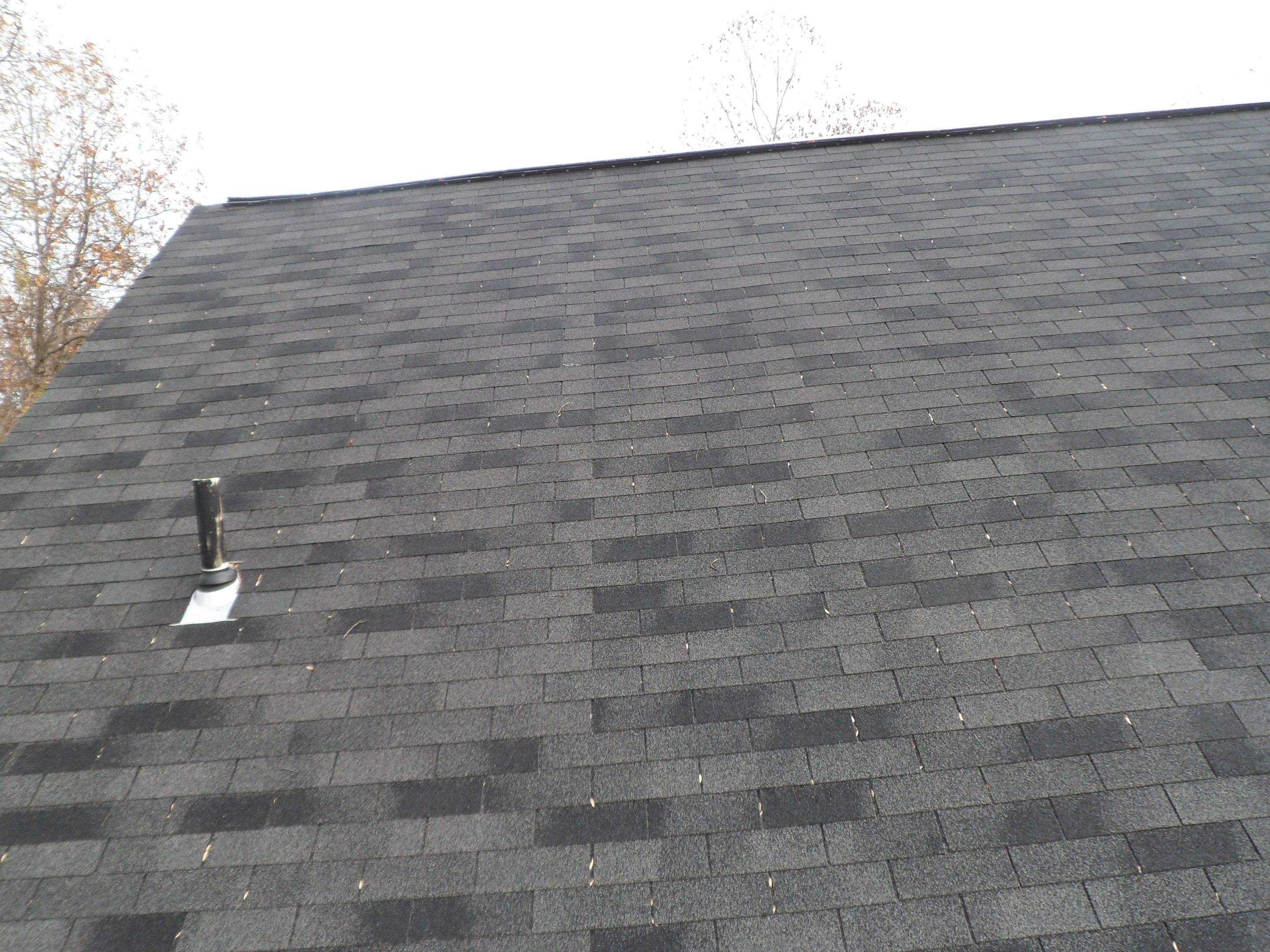 Residential Roofing Installation using Charcoal Black by Alpha Design Services