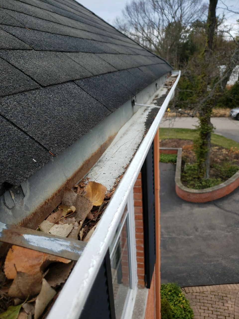 Flat Roof Replacement and Copper Gutter Installation by Custom Installations