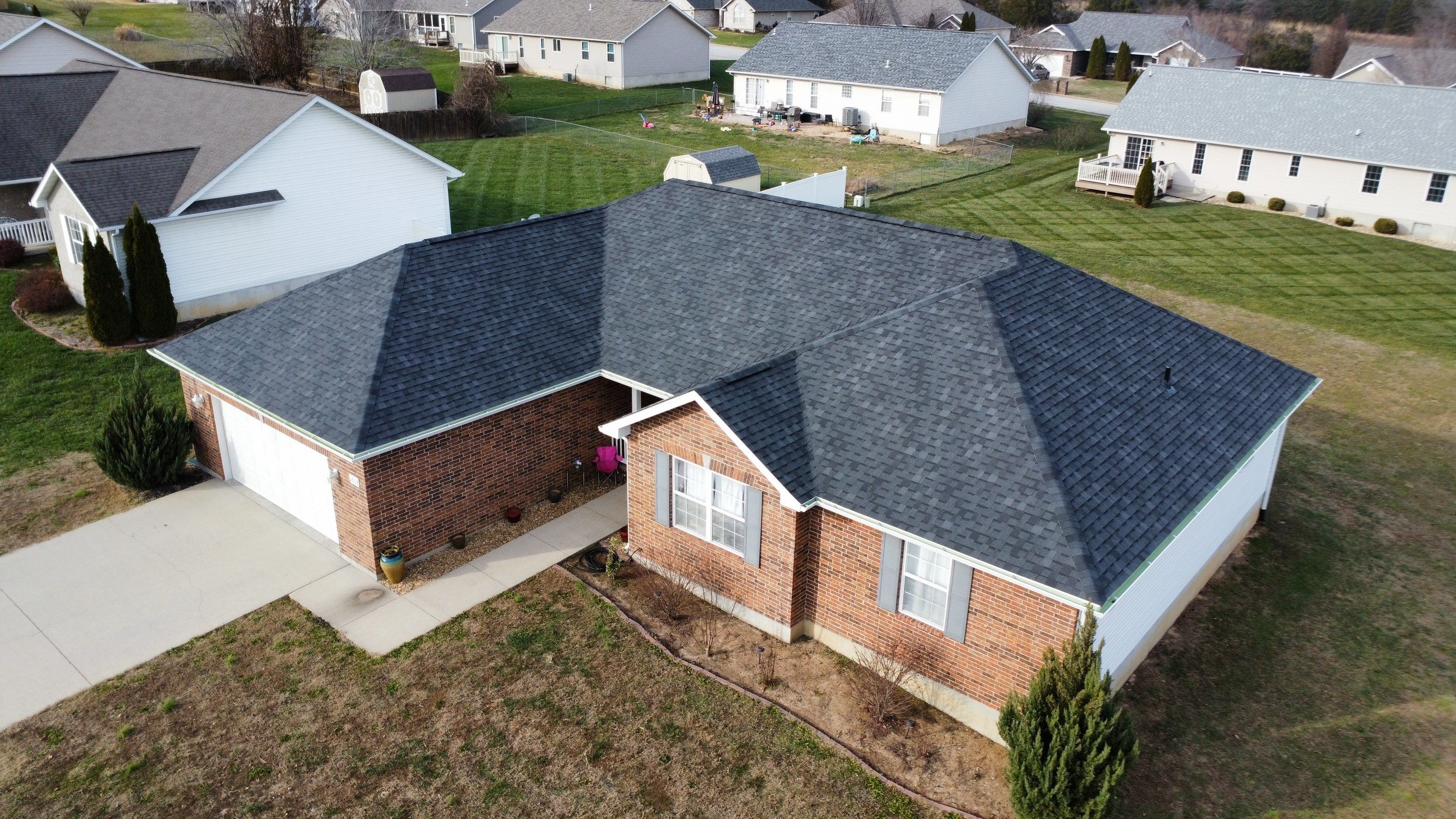 Residential Roofing & Siding Replacement - Atlas Pinnacle Pristine Shingle in the color Black Shadow  by Titan Commercial & Residential Roofing 