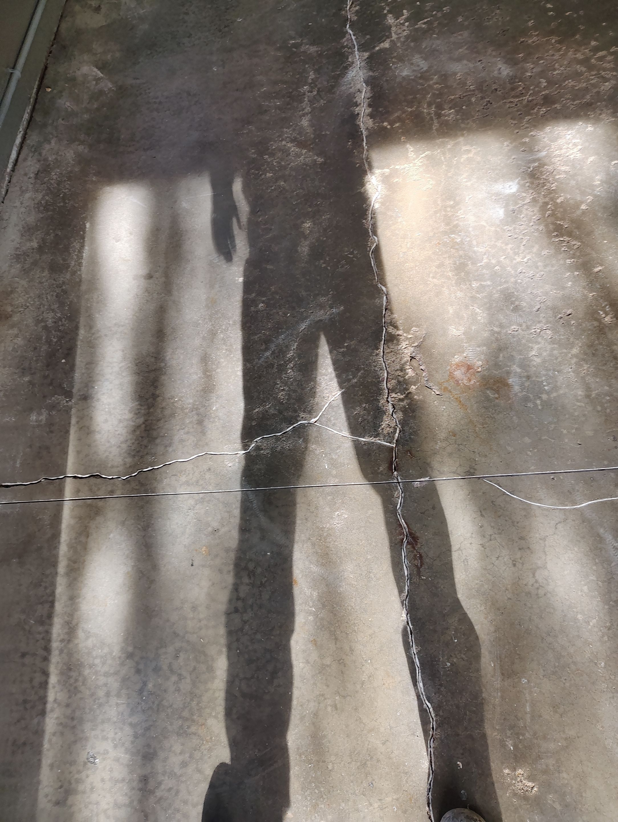 Garage Floor Concrete Coating and Crack Repair in Sioux Falls by Select Painting, Coatings & Garage Cabinets